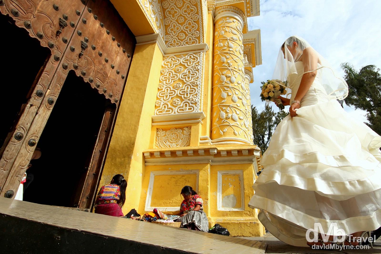 A bride entering the Iglesia y Convento de Nuestra Senora de la Merced, Antigua, Guatemala. May 25th 2013.