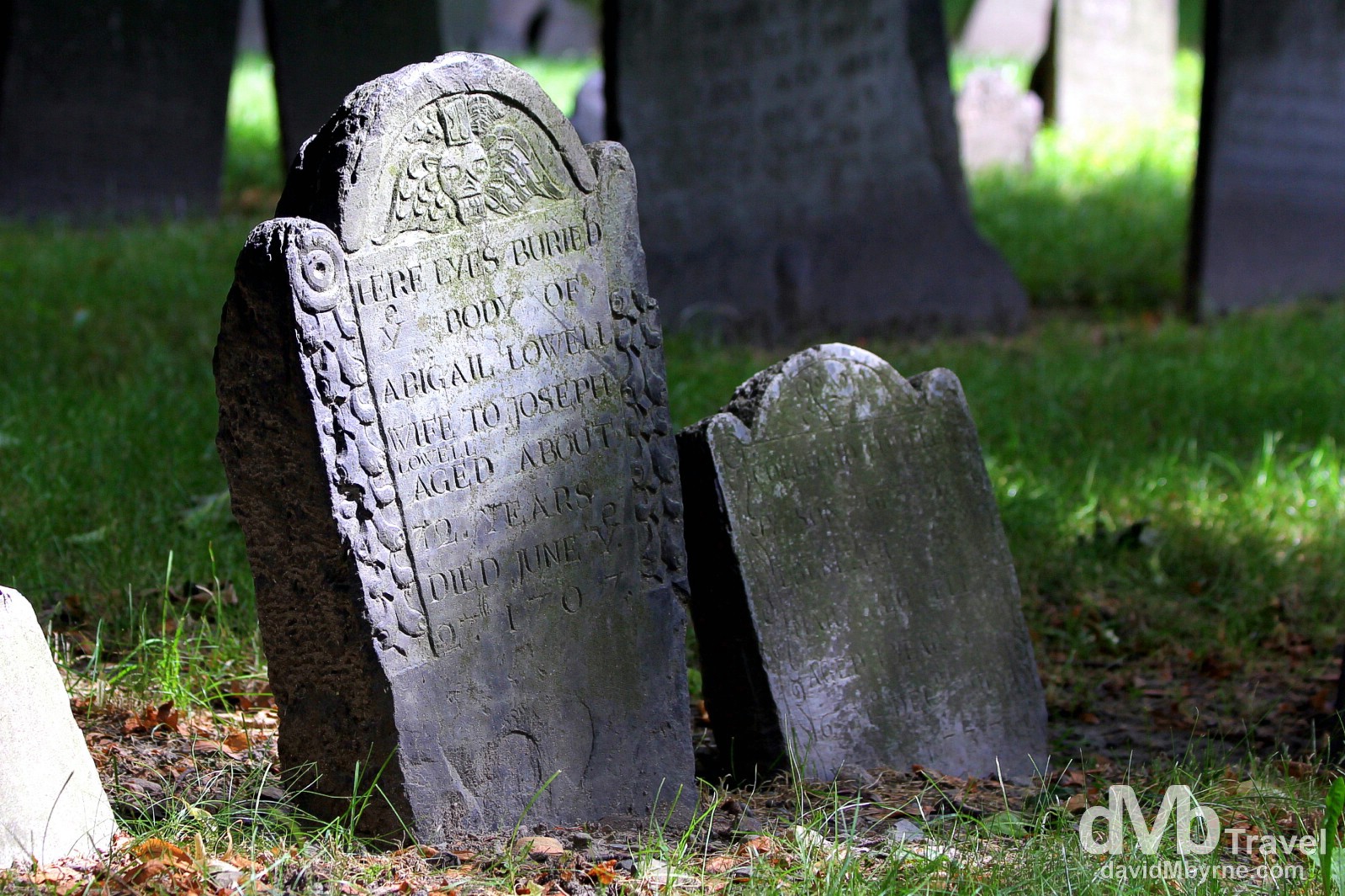 Gravestones in Granary Burying Ground, Tremont Street, Boston. So named because of its proximity to Boston’s first granary, the 1660, 2-acre cemetery is one of the oldest historic sites in the city, yet ‘only’ the third oldest burying ground in Boston - this place is ye olde indeed. It contains 2,345 gravestones and 204 tombs and is the final resting place for may a prominent Bostonian & revolutionary, including John Hancock & Samuel Adams, signers of the American Declaration of Independence. Granary Burying Ground, Tremont Street, Boston, Massachusetts, USA. July 15th 2013.
