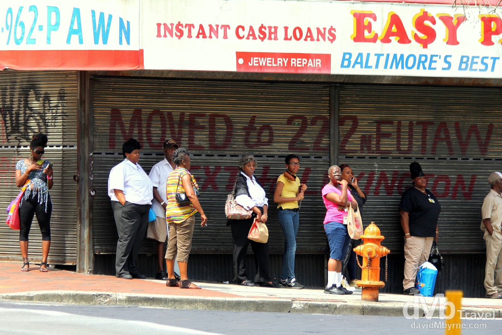 Hanging out on a corner of Howard Street, Westside, Baltimore, Maryland, USA. July 10th 2013.
