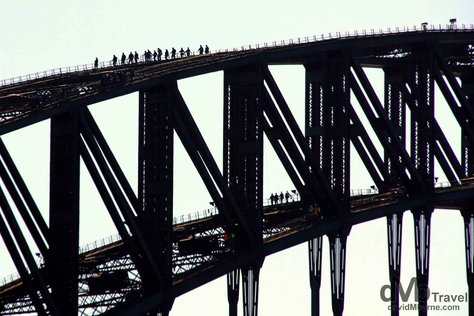 Climbers on the Sydney Harbour Bridge as seen from the Manly Ferry in Sydney Cove, Sydney, Australia. June 8th 2012. 