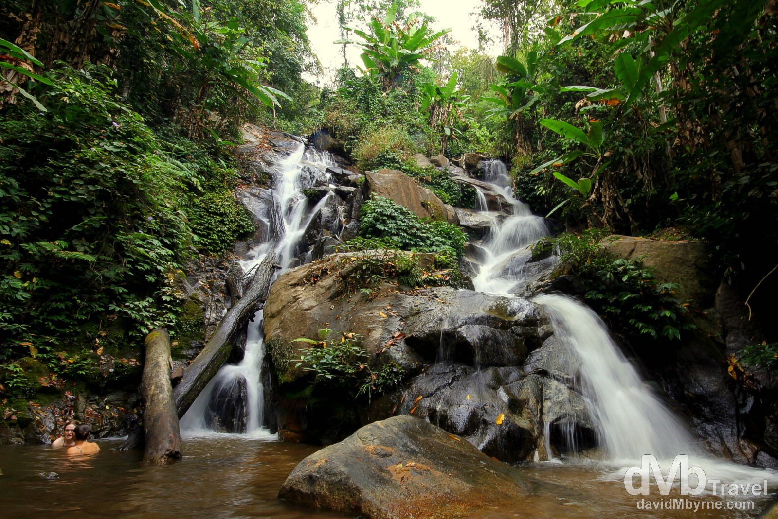 Wading in the pool at the base of the Houykeaw Waterfall. Doihang, Chaing Rai Province, northern Thailand. March 12th 2012. 