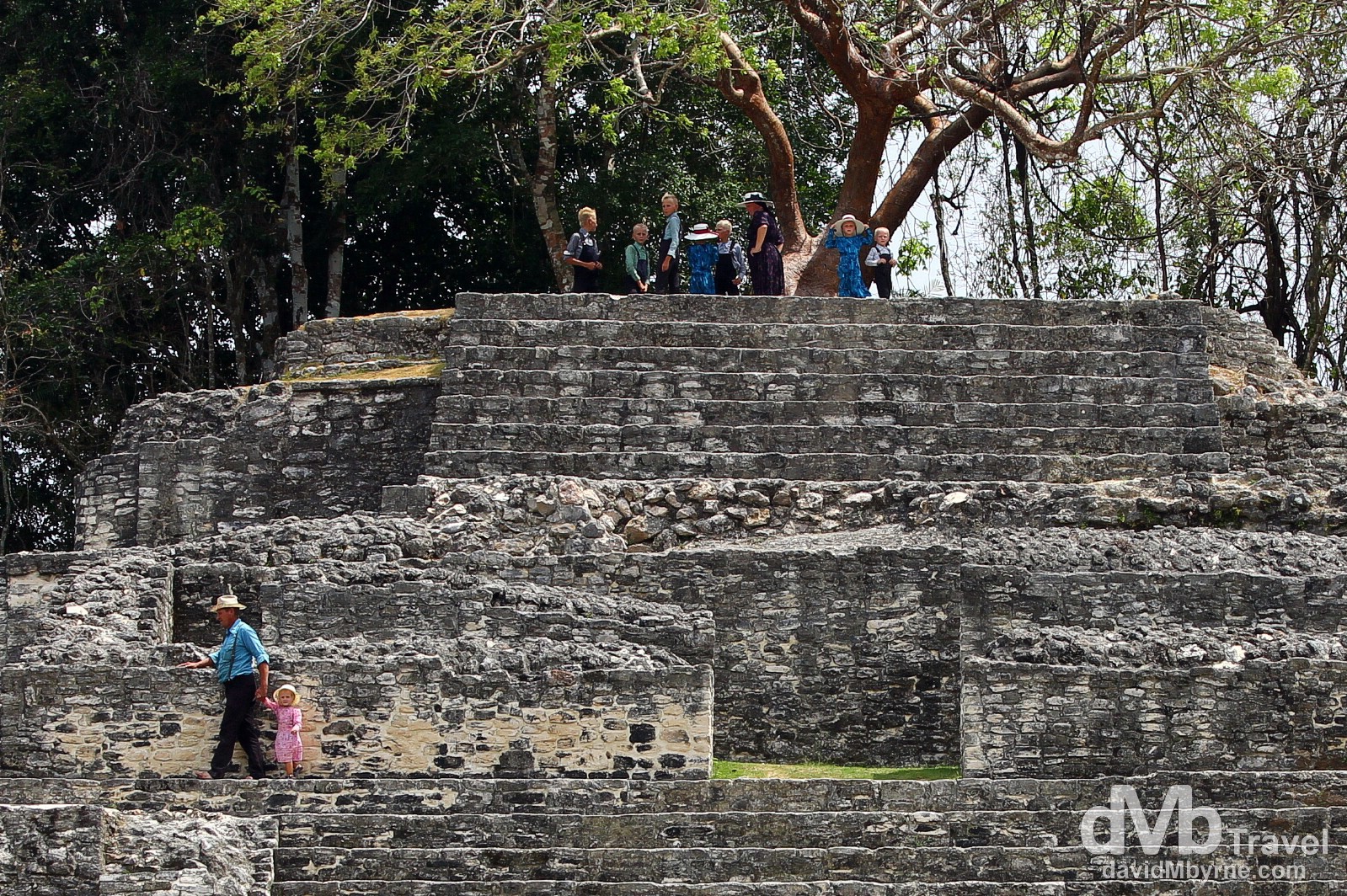 A Mennonite family on the Jaguar Temple at the Lamanai Mayan ruins in Central Belize. May 11th 2013.