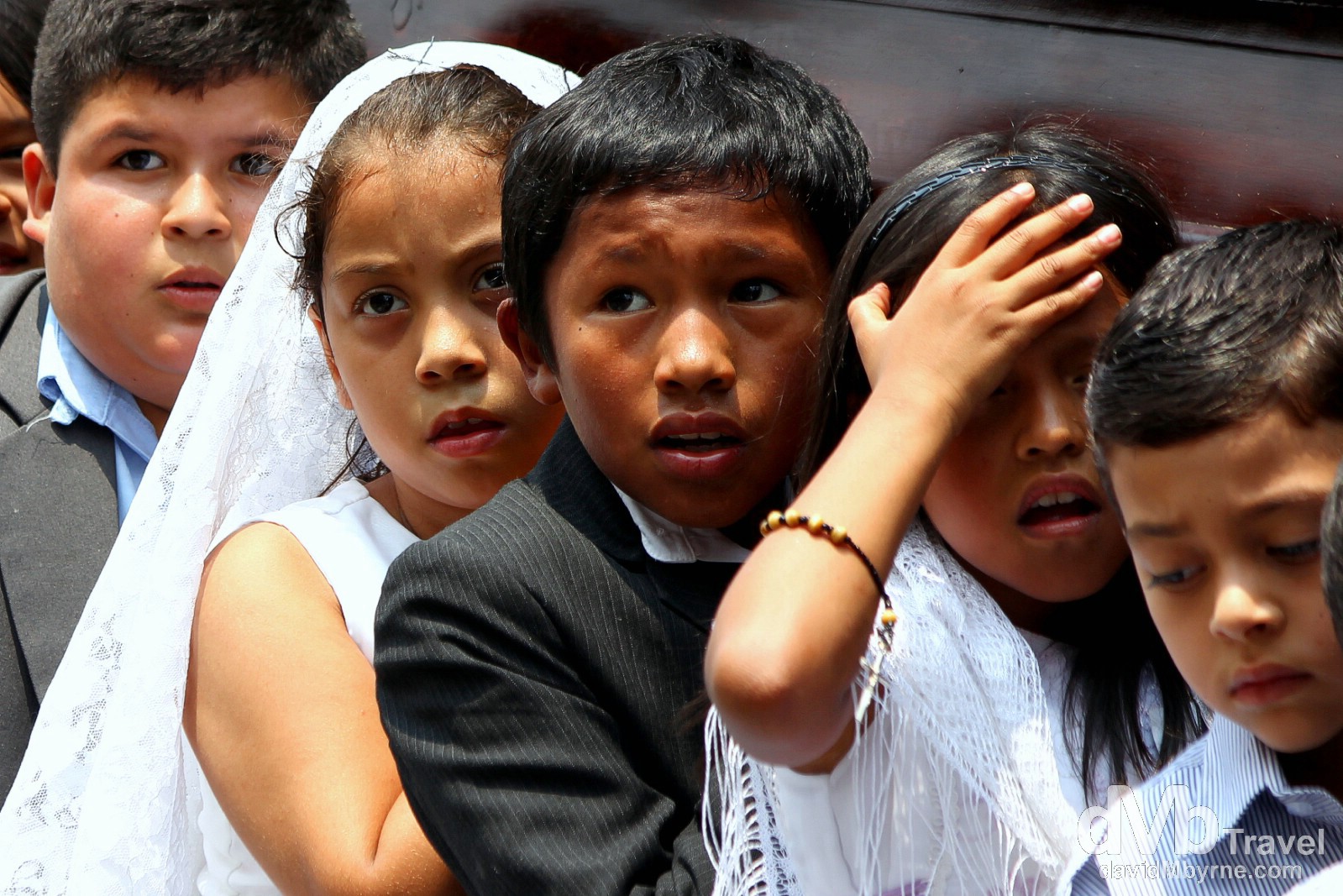 Children carrying a coffin as part of a religious ceremony in Parque Central, Antigua, Guatemala. May 19th 2013.