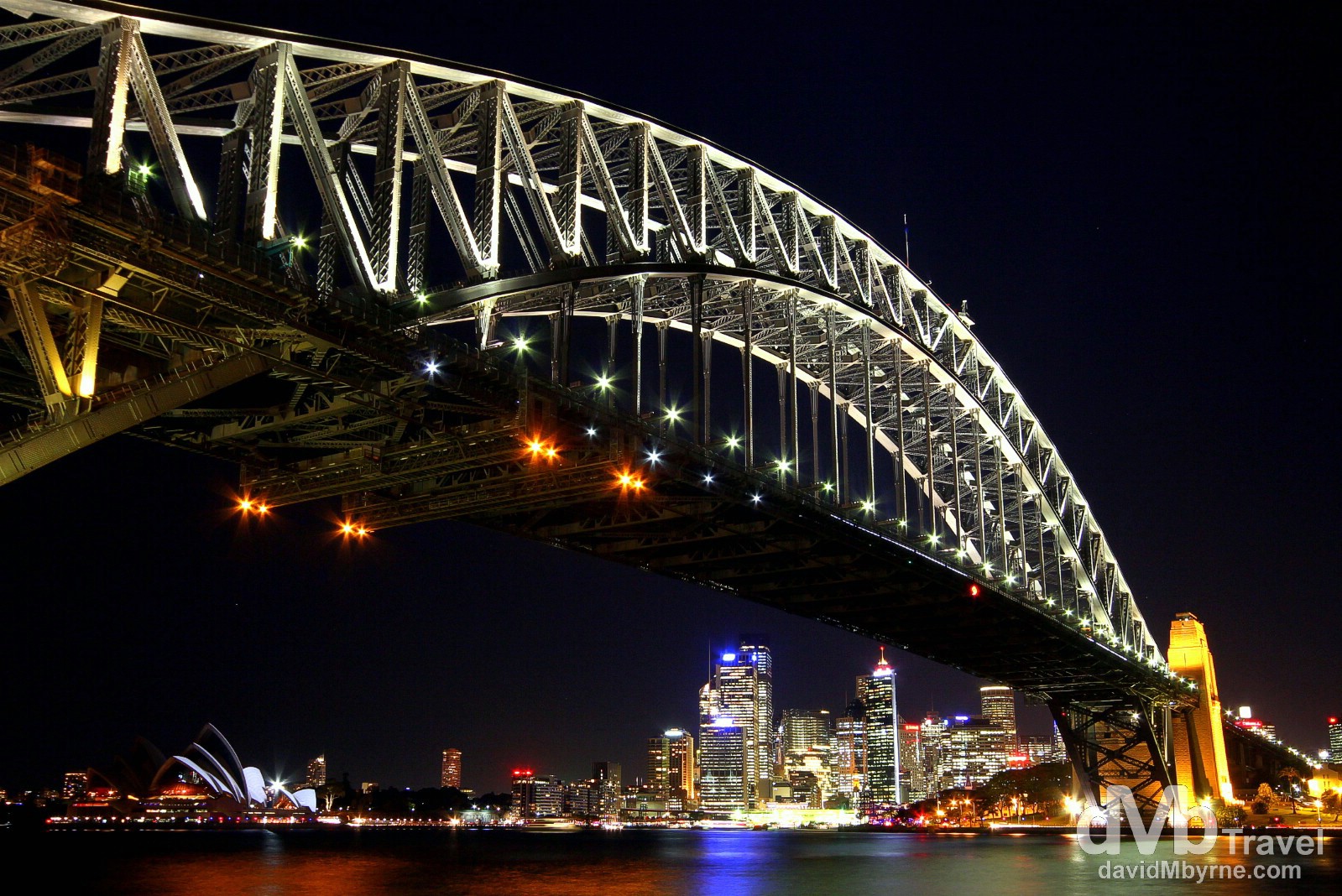 The Sydney CBD as seen at night from under the Harbour Bridge in the Kirribilli district of the city. June 7th 2012.  