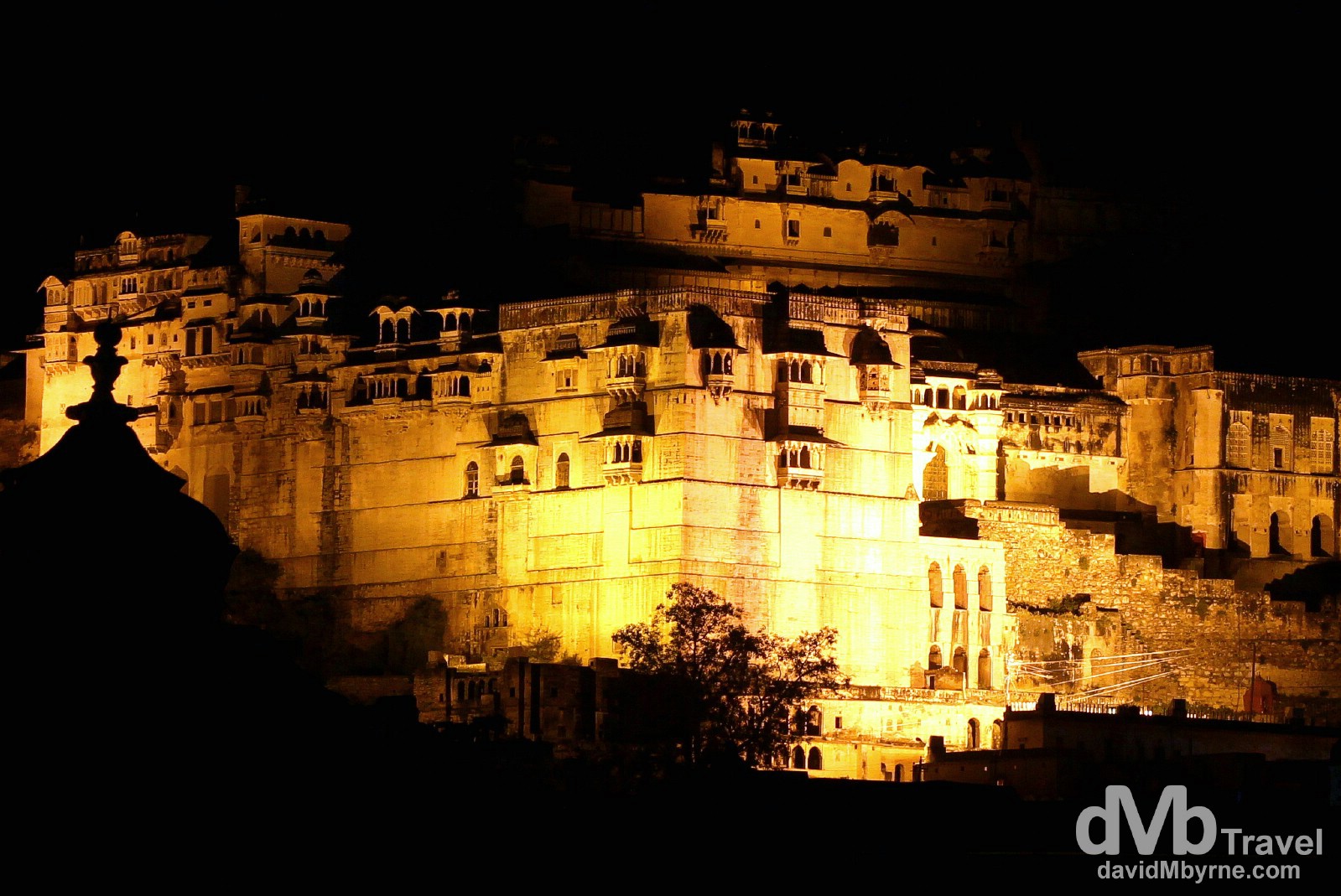 The imposing façade of Bundi Palace at night as seen from the rooftops of Old Town Bundi, Rajasthan, India. October 1st 2012.