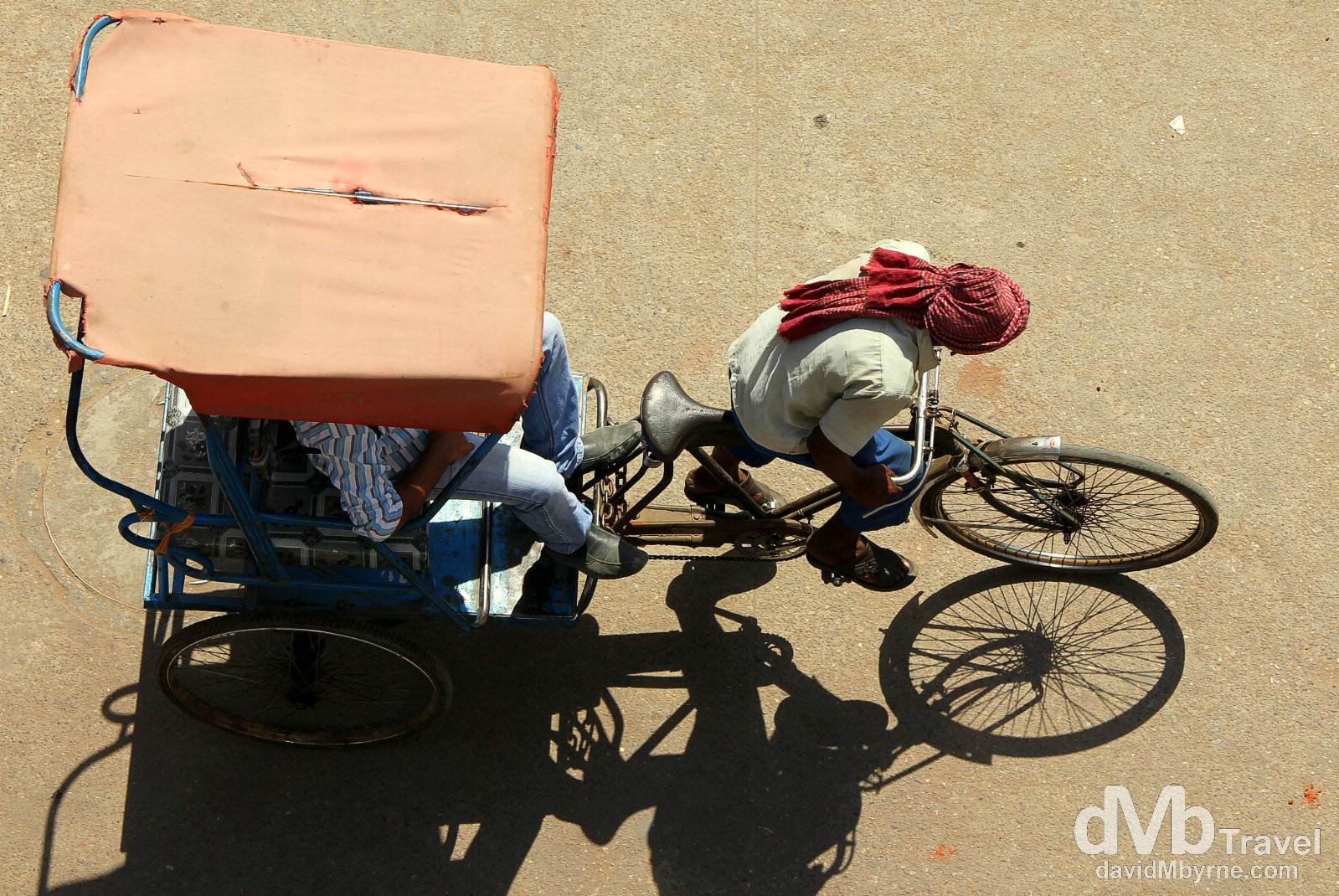 A cyclo (cycle rickshaw) on the Main Bazaar, Paharganj, Delhi, India. October 8th 2012.