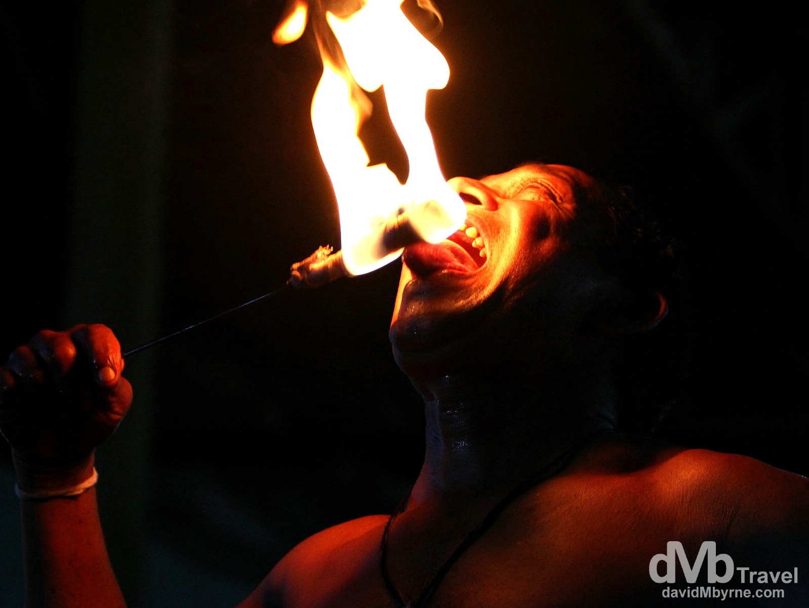 Eating fire as part of a Cultural Performance at the Kandyan Art Association & Cultural Centre, Kandy, Sri Lanka. September 9th 2012. 