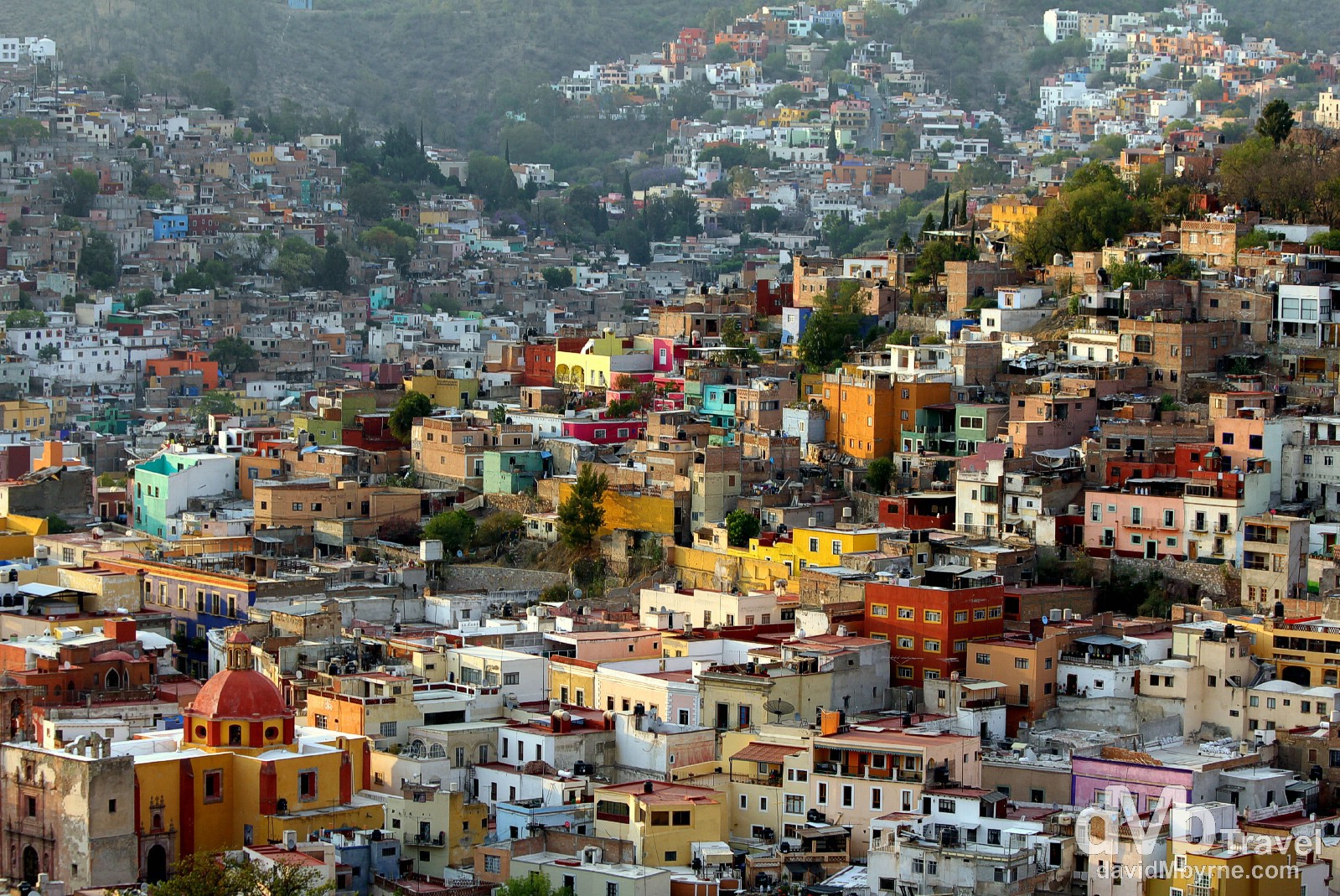 The city of Guanajuato is very compact, which means you can walk just about everywhere of interest. That said, it's very hilly, the result of being located in a ravine in the Sierra de Media Luna - virtually every point in the city is on a slant. But ignore all that. Just walk. Meander the numerous sinuous and narrow streets, all lined with multi-storied, brightly painted colonial homes. Go up those endless stairs, or down into the unknown, through one of the many dark, unique one-way tunnels. Go left, until you hit a dead end. Go back and go right. It'll bring you somewhere fascinating. Explore. Get lost, if you can. It's so much fun. Oh, and don't forget your camera. Please don't forget your camera. Not here. Guanajuato, Mexico. April 23rd 2013.