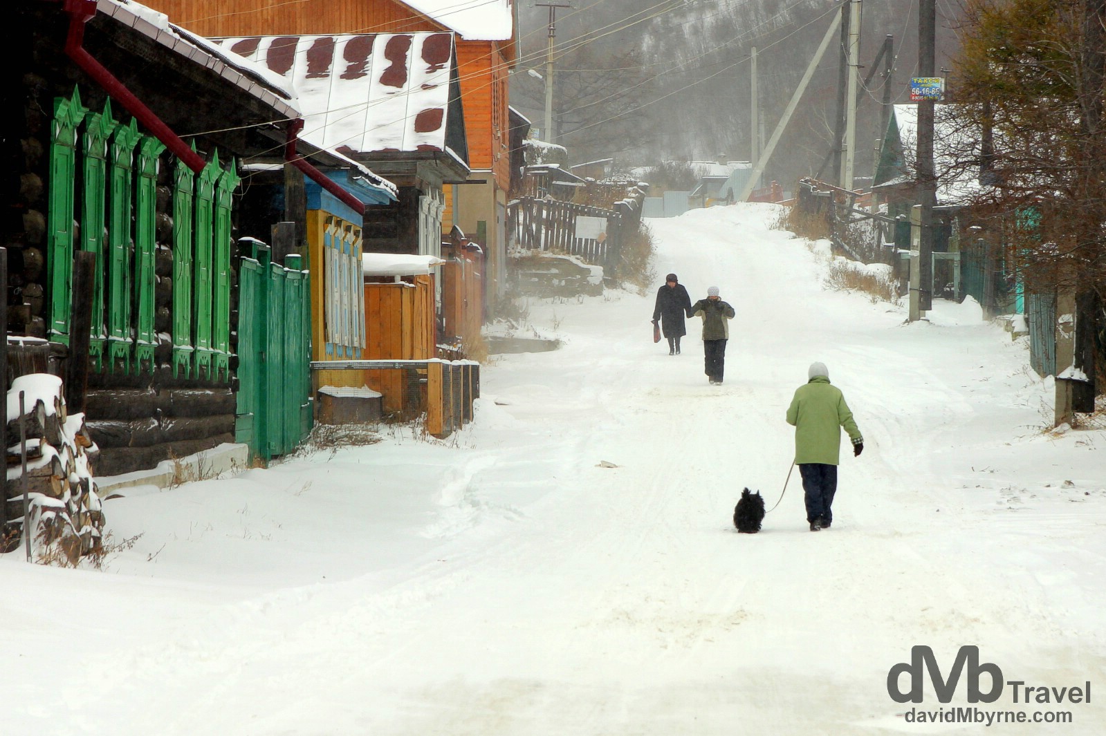  Walking in the snow in the village of Listvyanka on the shores of Lake Baikal, Irkutsk Oblat, Russia. November 9th 2012