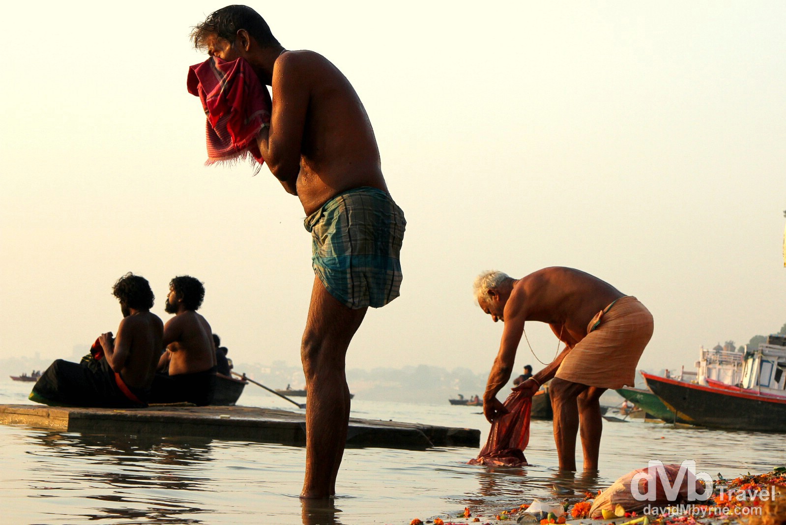 Sunrise bathing in the River Ganges, Varanasi, Uttar Pradesh, India. October 13th 2012.