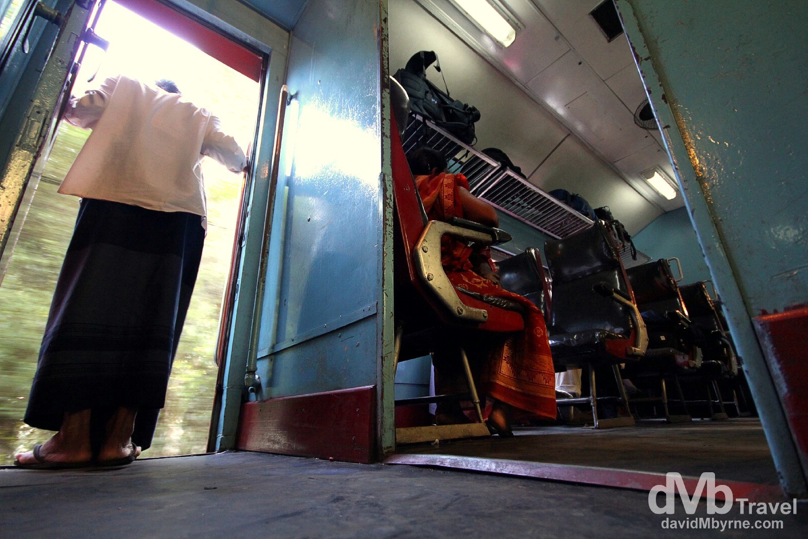 A sparsely populated second class carriage on the Badulla to Colombo train, Sri Lanka. September 5th 2012.