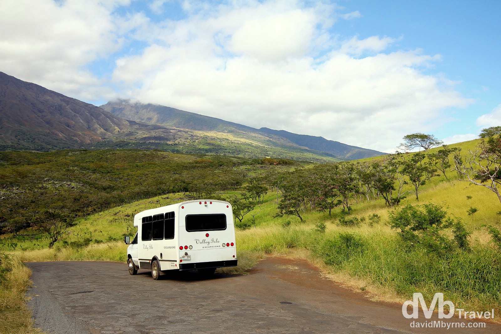 A Valley Isle Excursions van on a section of the 'Road To Hana' tour on the Piilani Highway/Kalama Park Road in southern Maui, Hawaii, USA. March 7th 2103.