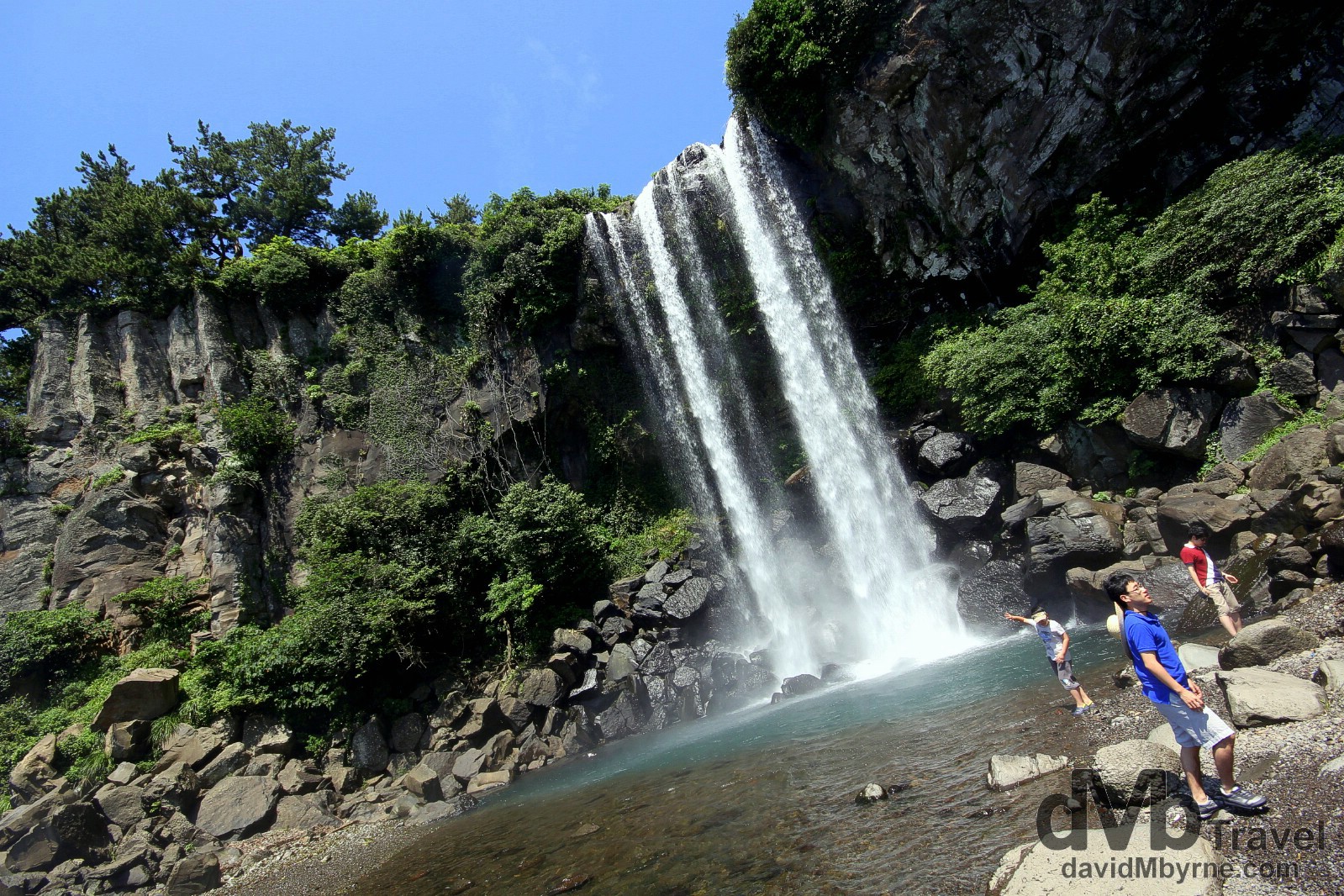 Jeongbang Waterfall, the only waterfall in Asia to fall directly into the ocean. Jeju Island, South Korea. July 16th 2011