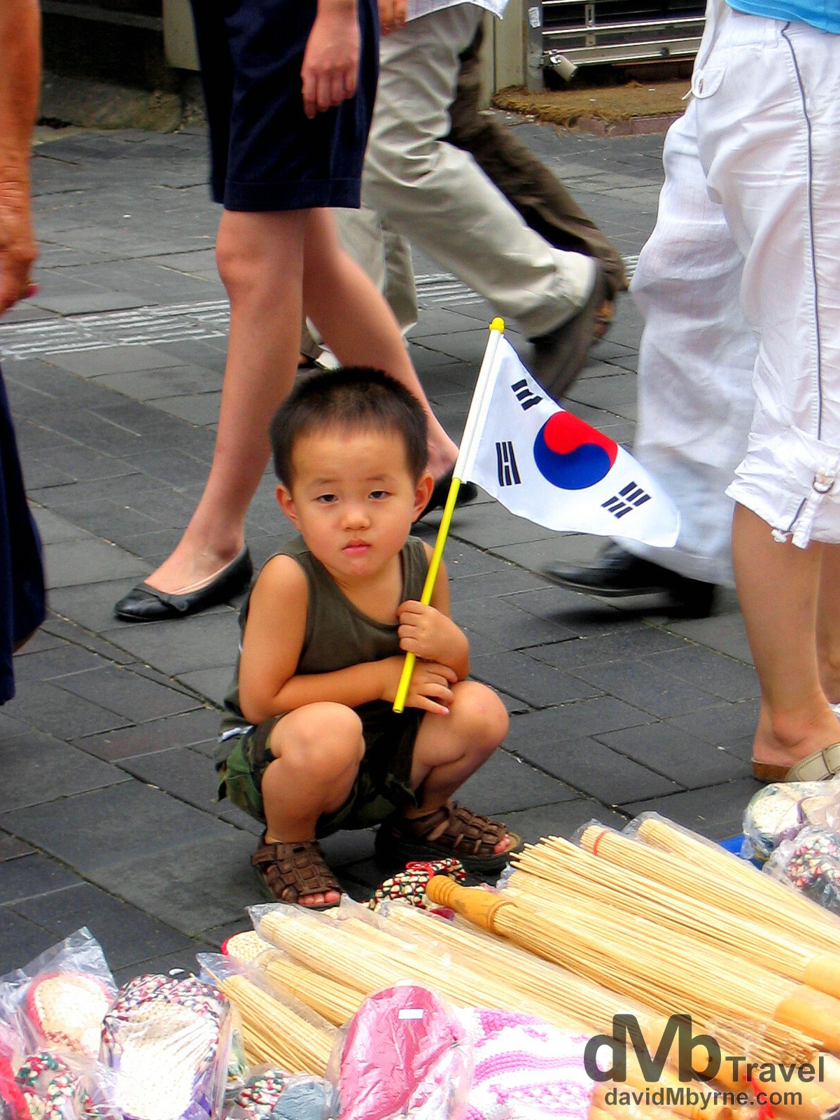A young flag-bearer in Insadong, Seoul, South Korea, on Korean Independence Day. August 15th 2004