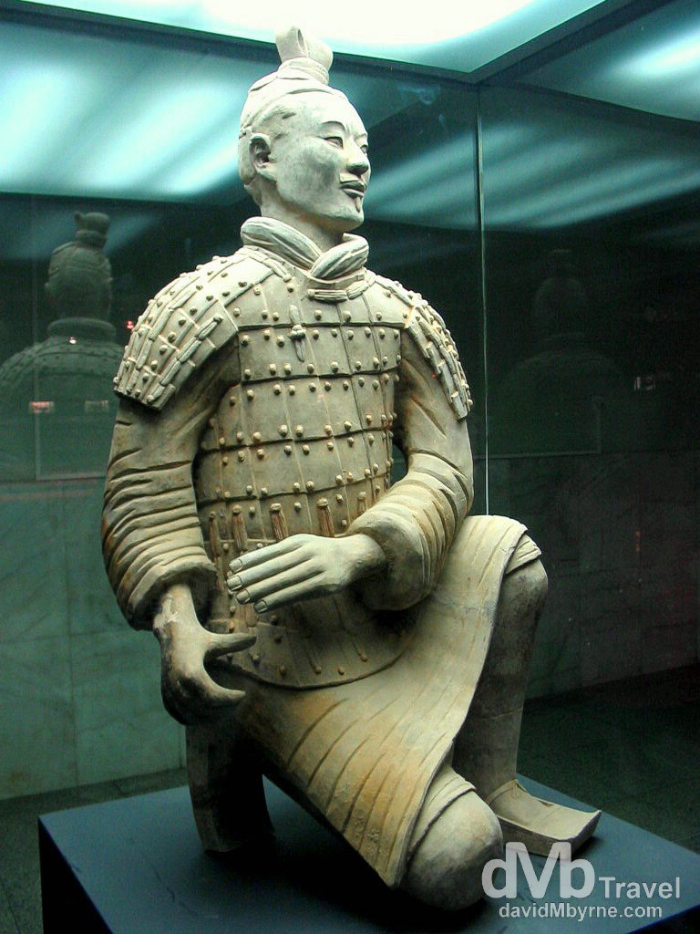 A kneeling archer figurine in the Museum of The Terracotta Army on the outskirts of Xian, Shaanxi Province, China. September 30th, 2004.