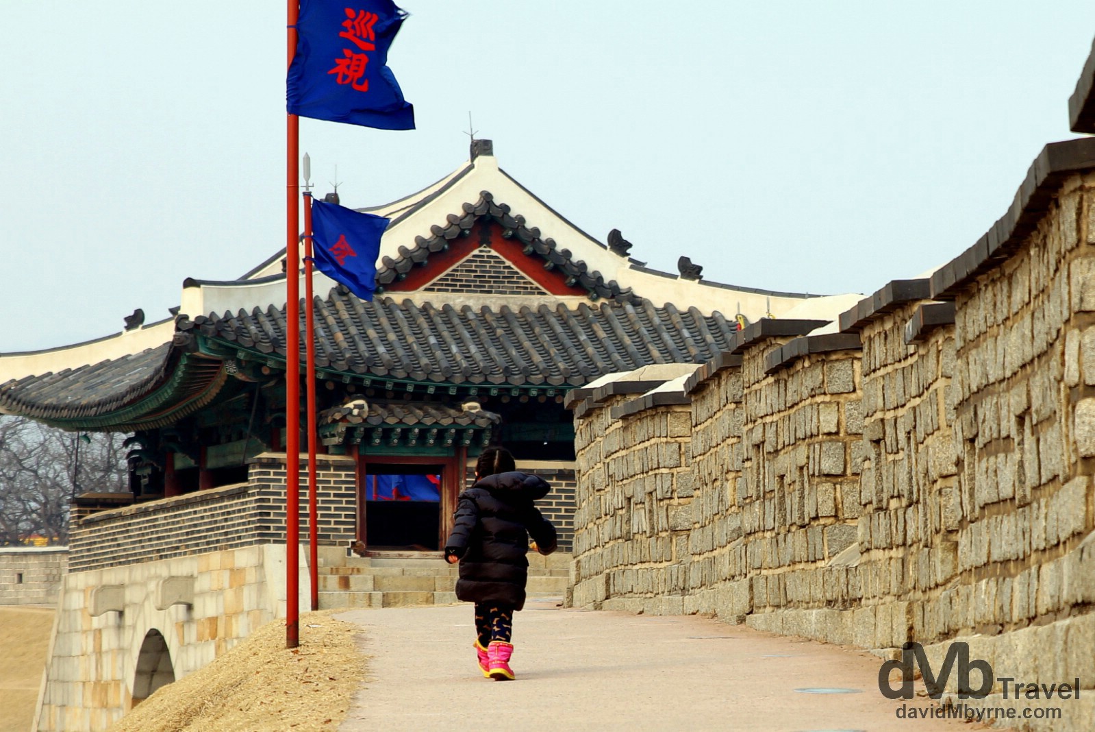 A young girl walks a section of the Suwon Hwaseong Fortress in Suwon, South Korea. February 23rd, 2014. 