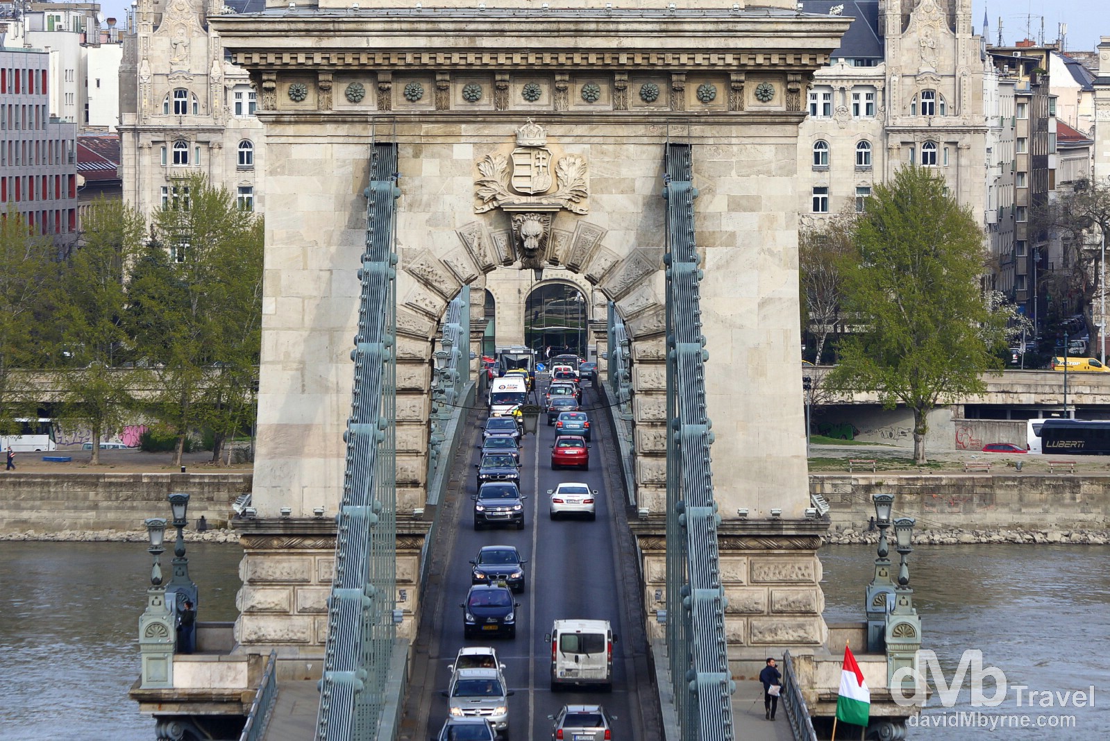 Traffic on the Chain Bridge spanning the Danube River in Budapest, Hungary. March 26th, 2014. 