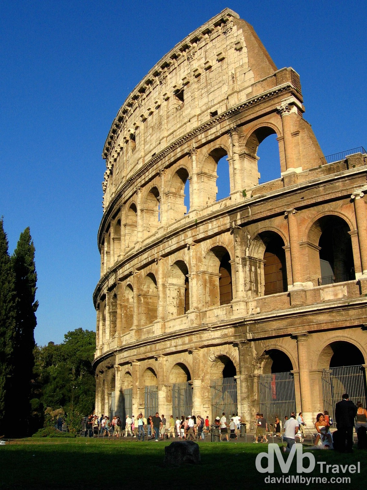 Walking by a section of the external facade of the Colosseum in Rome, Italy. September 1st, 2007. 