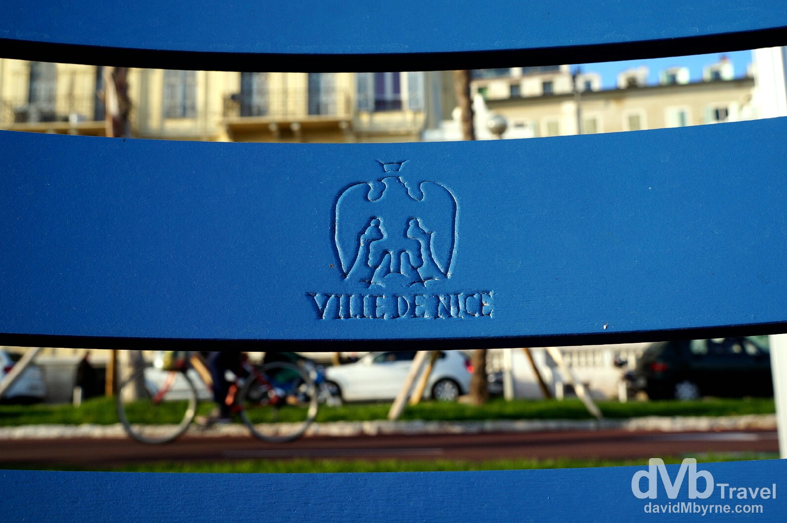 Distinctive blue seats on the beachfront Promenade des Anglais, Nice, Côte d'Azur, France. March 14, 2014.