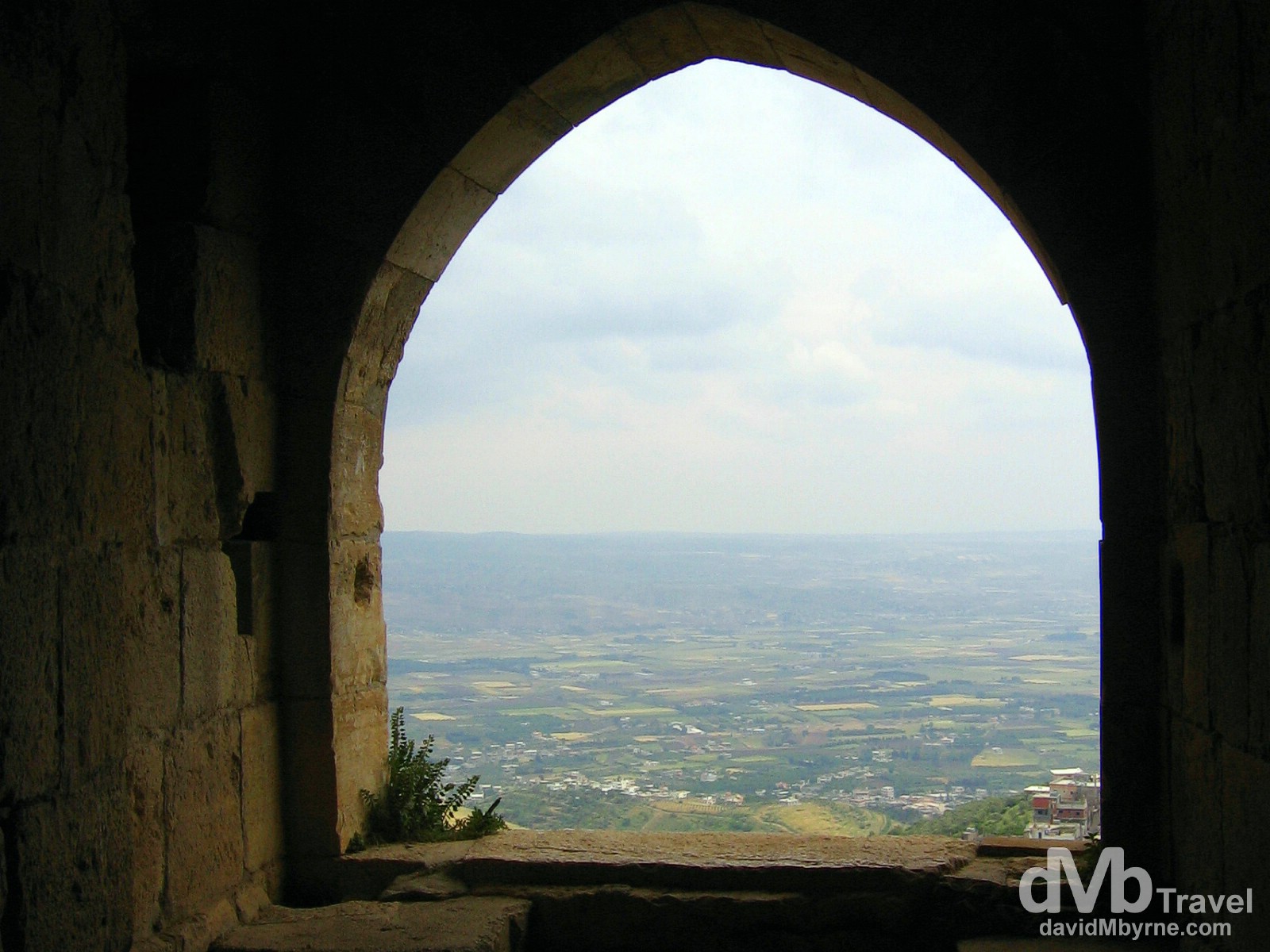 The view of the Syrian countryside from an opening of the Crusader castle Crac des Chevaliers. May 7, 2008.