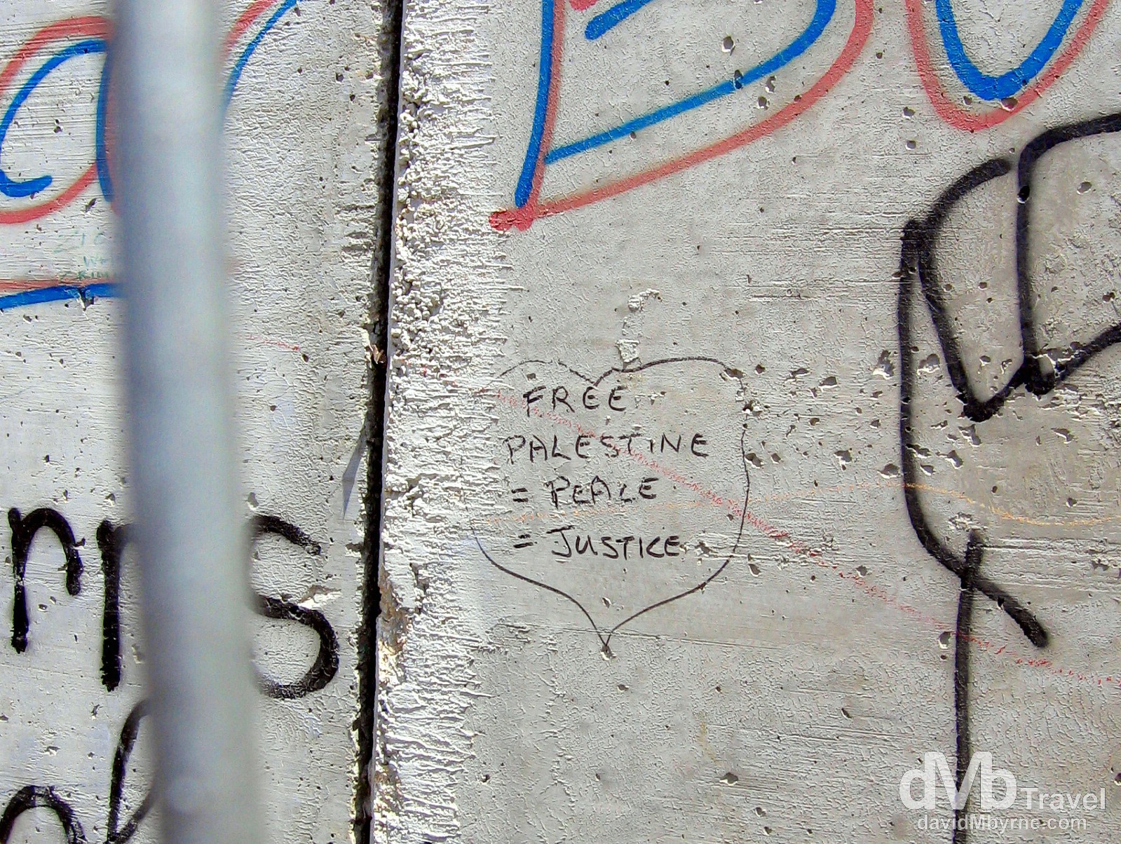 Free Palestine. A section of the heavily guarded wall separating the Palestinian West Back from Israel. May 2, 2008. 