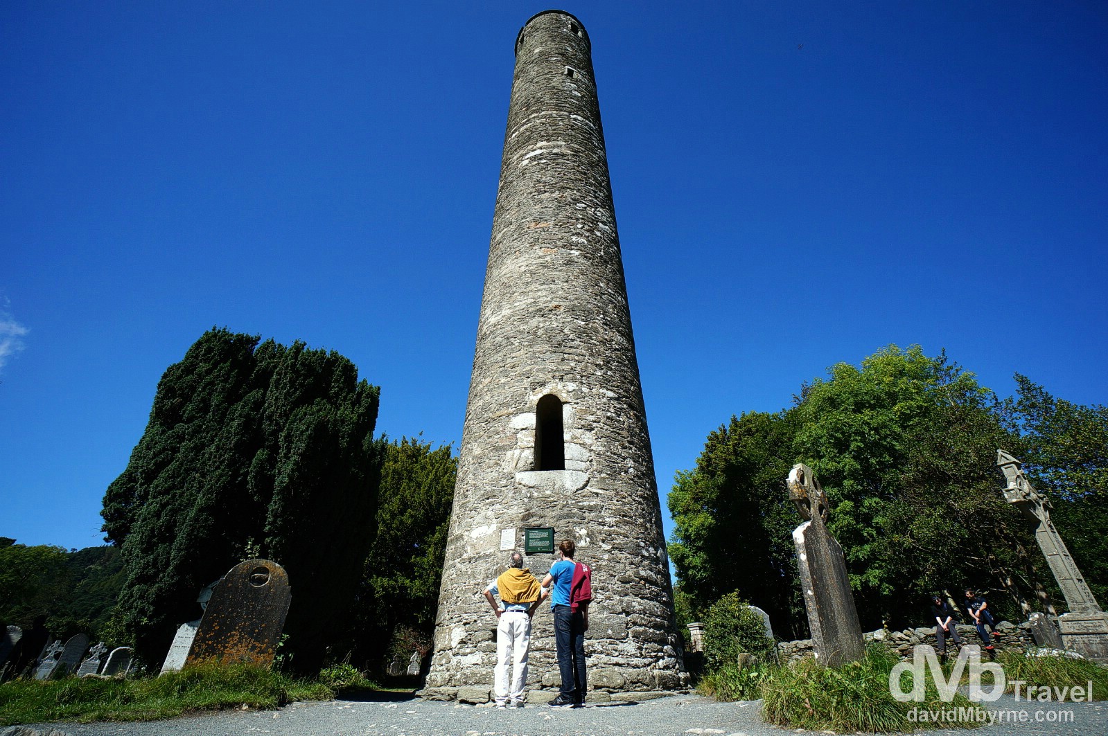 Admiring the Round Tower in Glendalough, Co. Wicklow, Ireland. August 31, 2014.