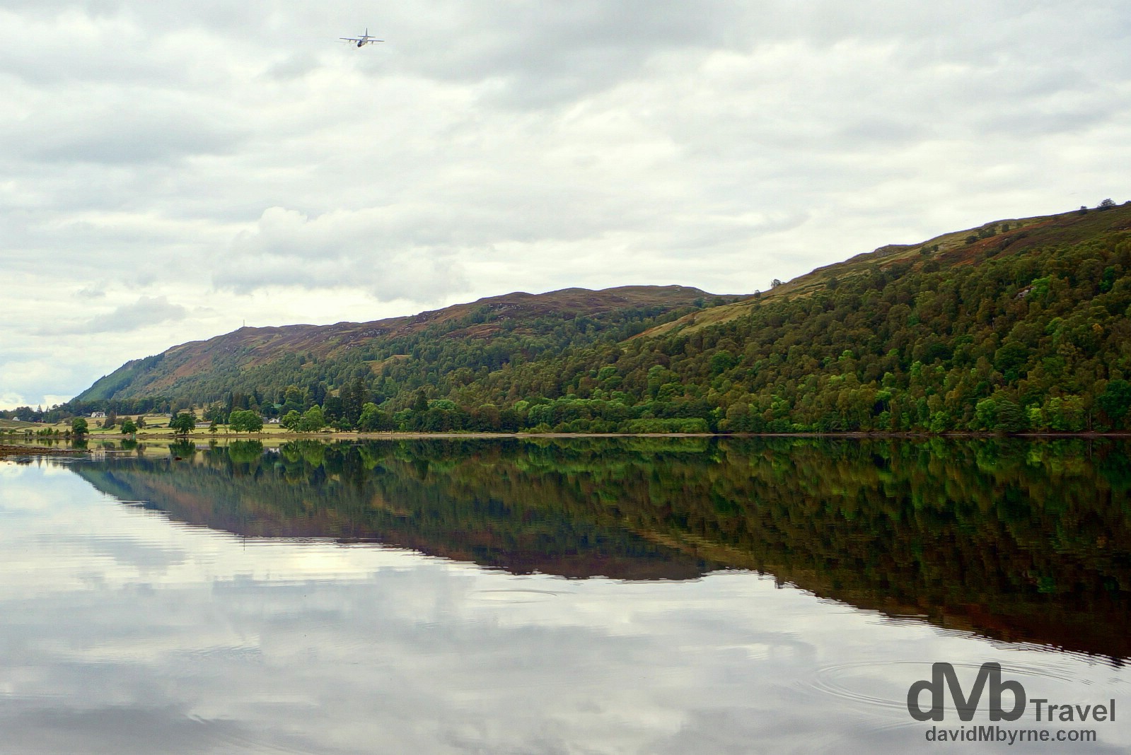 A military cargo plane fly-by over the waters of Loch Oich, Highlands, Scotland. September 16, 2014.