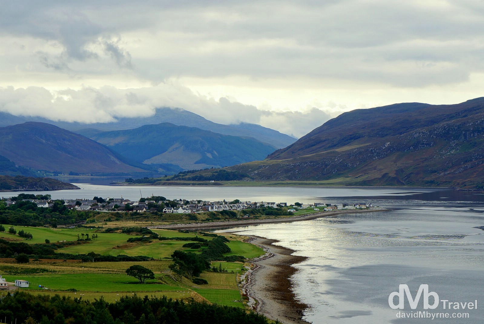 The town of Ullapool on the eastern shore of Lock Broom as seen from the A835 entering town. Highlands, Scotland. September 16, 2014.