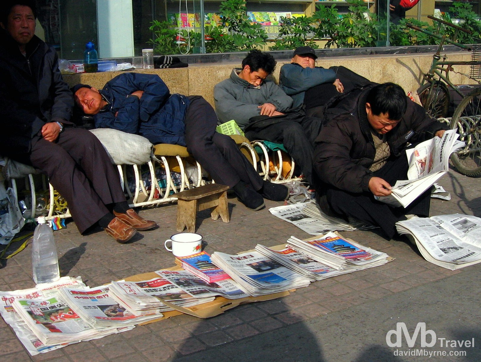 Snoozing on the streets of Beijing, China. February 10. 2006.