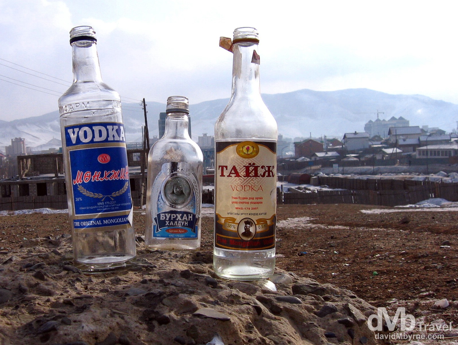 Discarded vodke bottles on Zaany Tolgoi, or Elephant's head, a hill overlooking Ulan Bator, Mongolia. February 15, 2006.