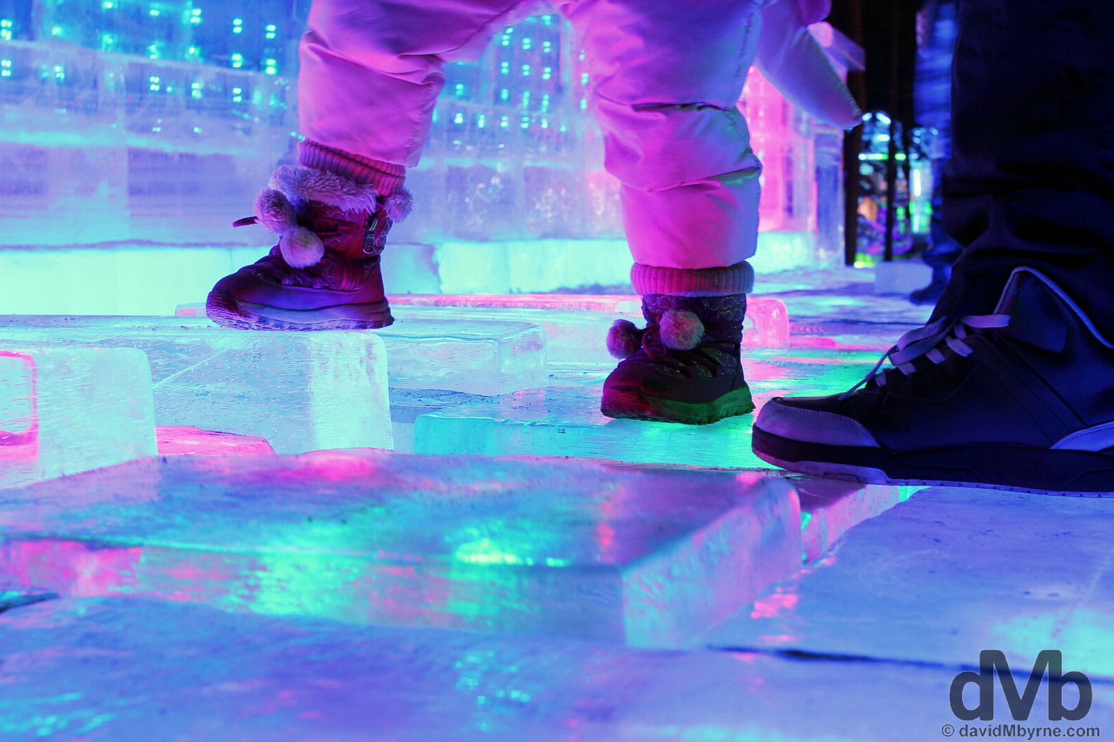 Little & not so little feet on the ice piano in Zhaolin Park as part of the annual International Ice and Snow Sculpture Festival in Harbin, China. February 6, 2015.