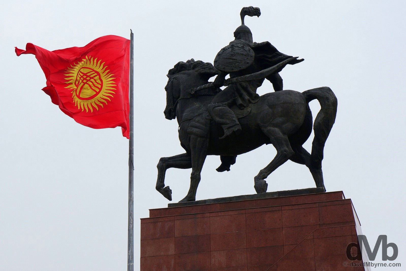 The Manas statue and Kyrgyz flag in Ala-Too Square, central Bishkek. February 25, 2005. 