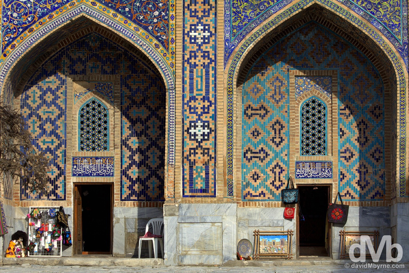 Souvenirs for sale in the courtyard of the Tilla-Kari Medressa of the Registan in Samarkand, Uzbekistan. March 8, 2015. 