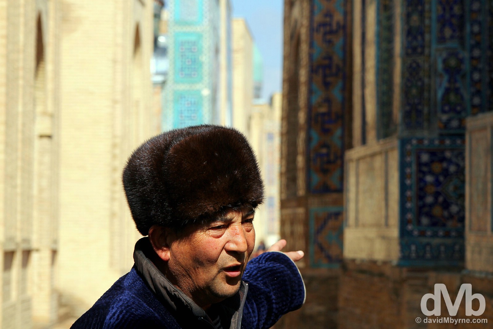 Pointing out detail at the Shah-i-Zinda, the Avenue of Mausoleums, in Samarkand, Uzbekistan. March 8, 2015. 