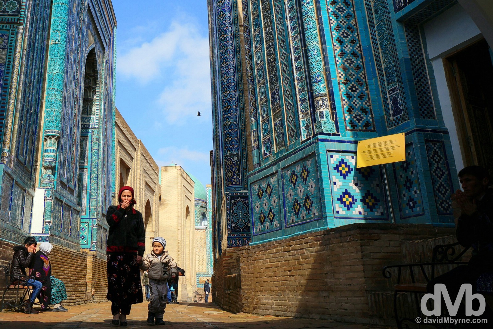 Walking through Shah-i-Zinda, the Avenue of Mausoleums, in Samarkand, Uzbekistan. March 8, 2015. 
