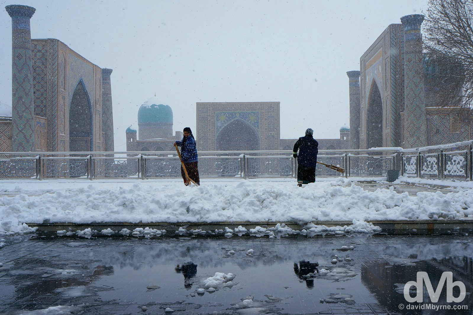 Clearing snow from the viewing platform overlooking the Registan in Samarkand, Uzbekistan. March 10, 2015.