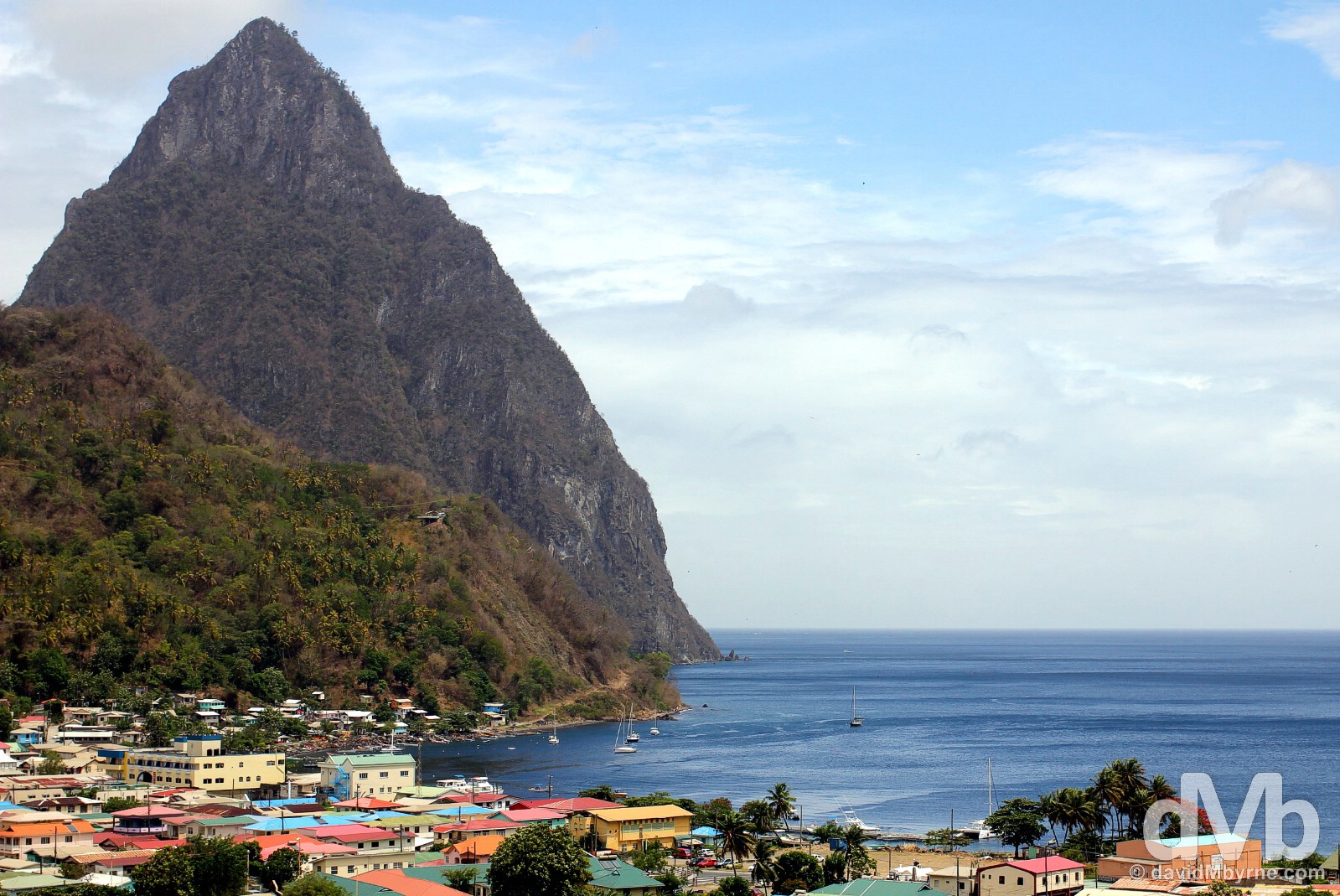 Petit Piton & the town of Soufriere in southeastern St. Lucia, Lesser Antilles. June 15, 2015.