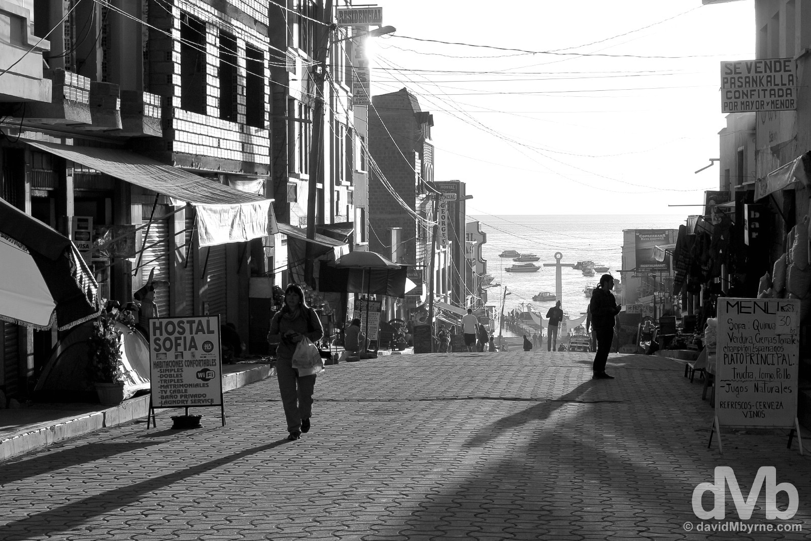 Late afternoon shadows on Avenue 6 de Agosto, tourist central in Copacabana, Bolivia. August 24, 2015. 