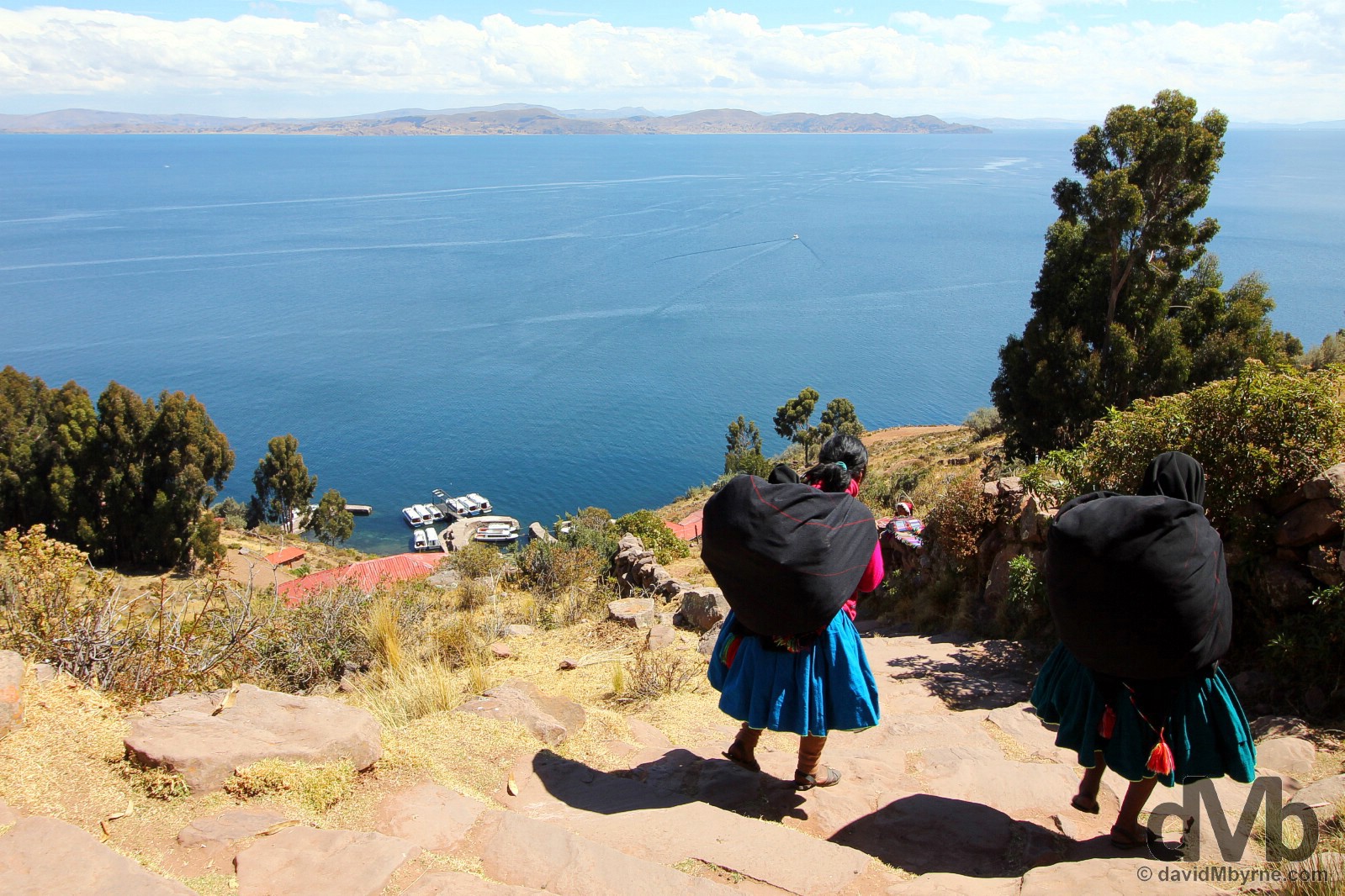 Locals descending to the port on Taquile Island, Lake Titicaca, Peru. August 21, 2015. 