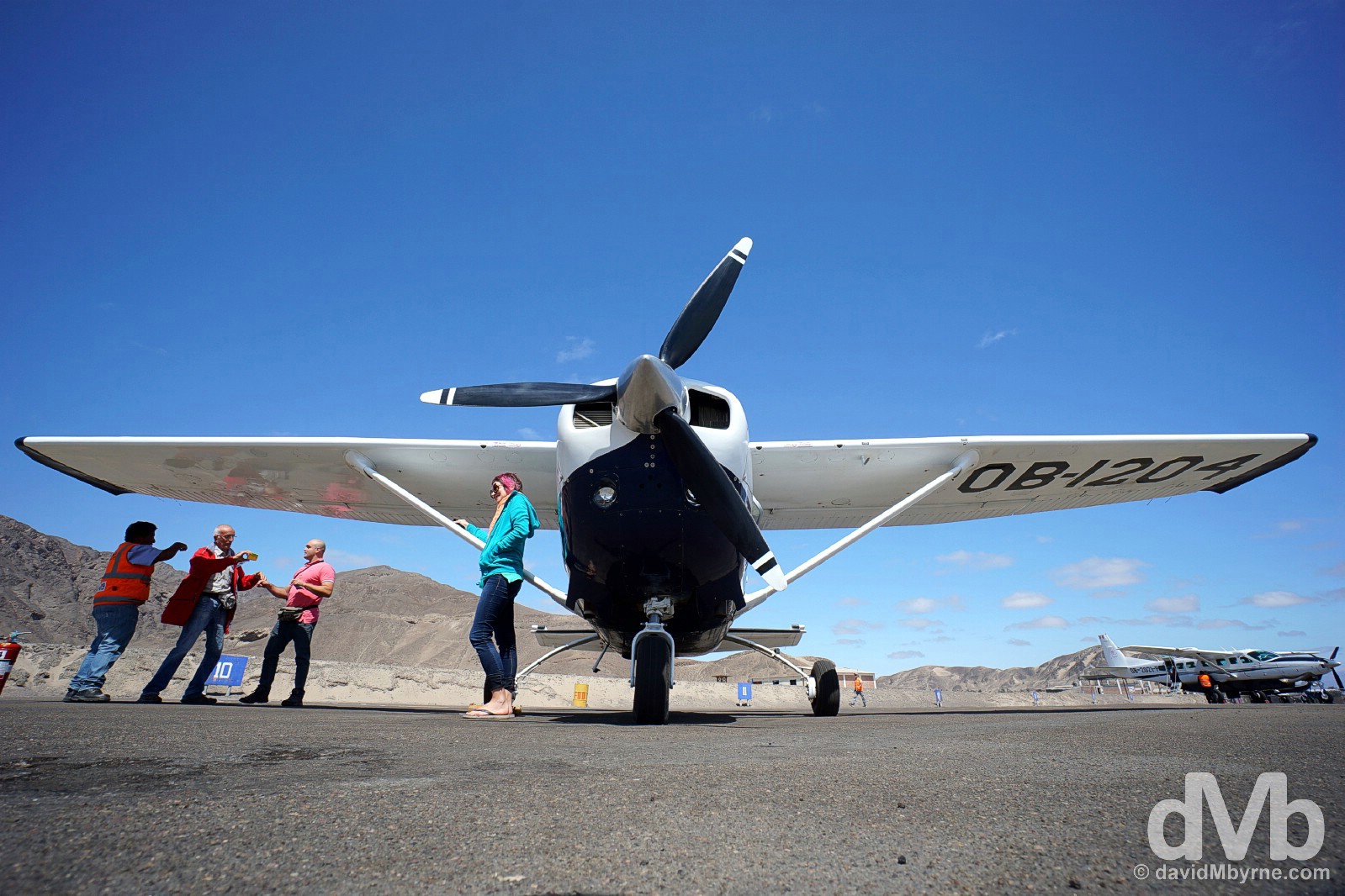 Cessna C206 on the tarmac of Nasca Airport prior to departure for a flight over the Nasca Plain to view the Nasca Lines. Nasca, southern Peru. August 11, 2015.