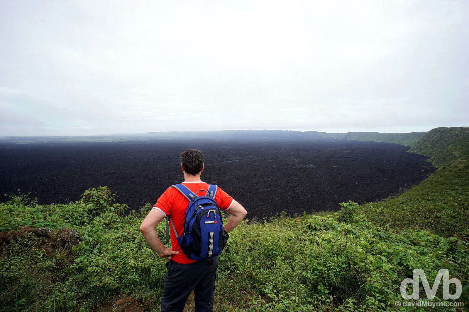 Overlooking the massive caldera of Sierra Negra on Isla Isabala, Galapagos, Ecuador. July 20, 2015.  