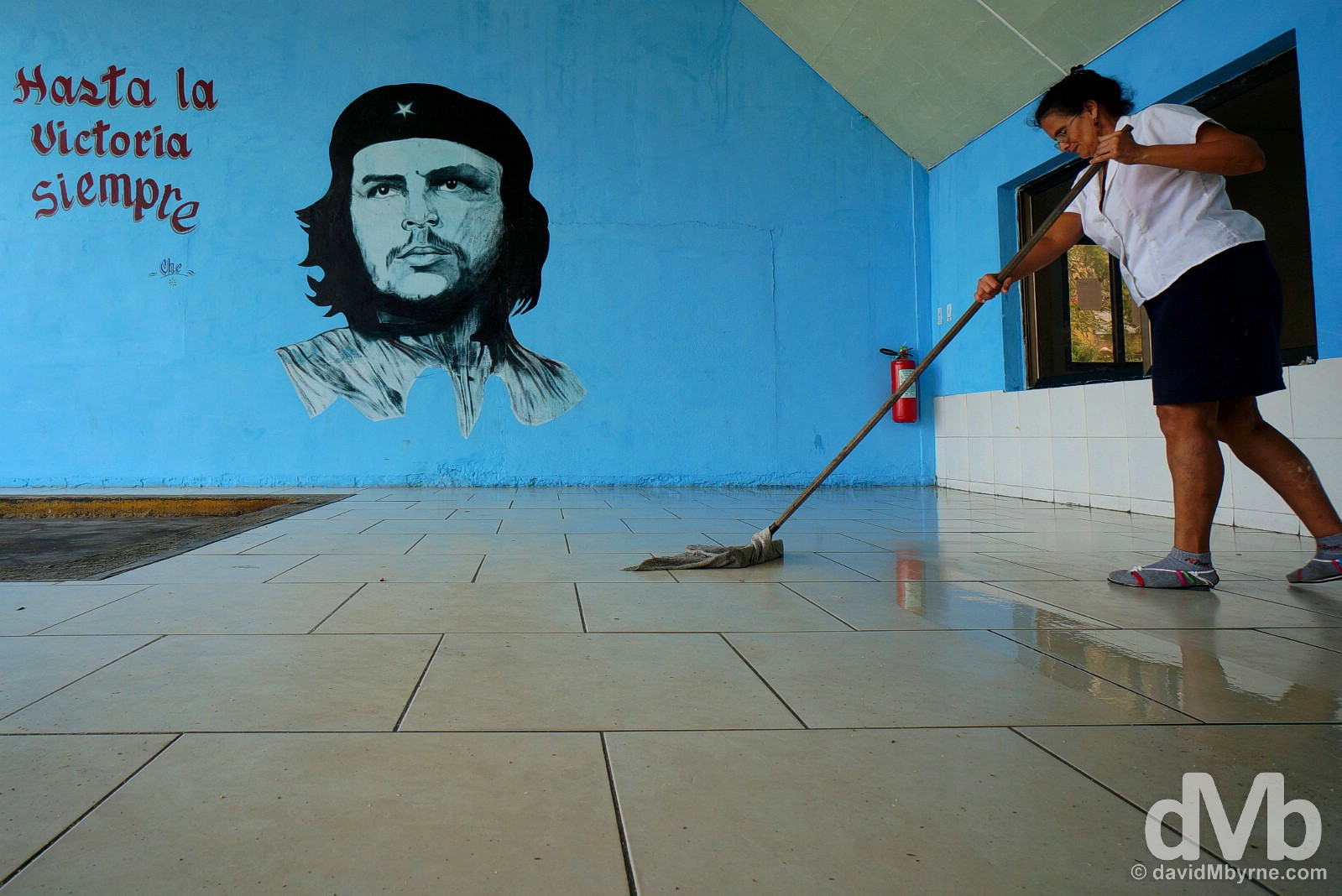 Mopping the floor of the bus station in Santa Clara, Cuba. May 3, 2015.