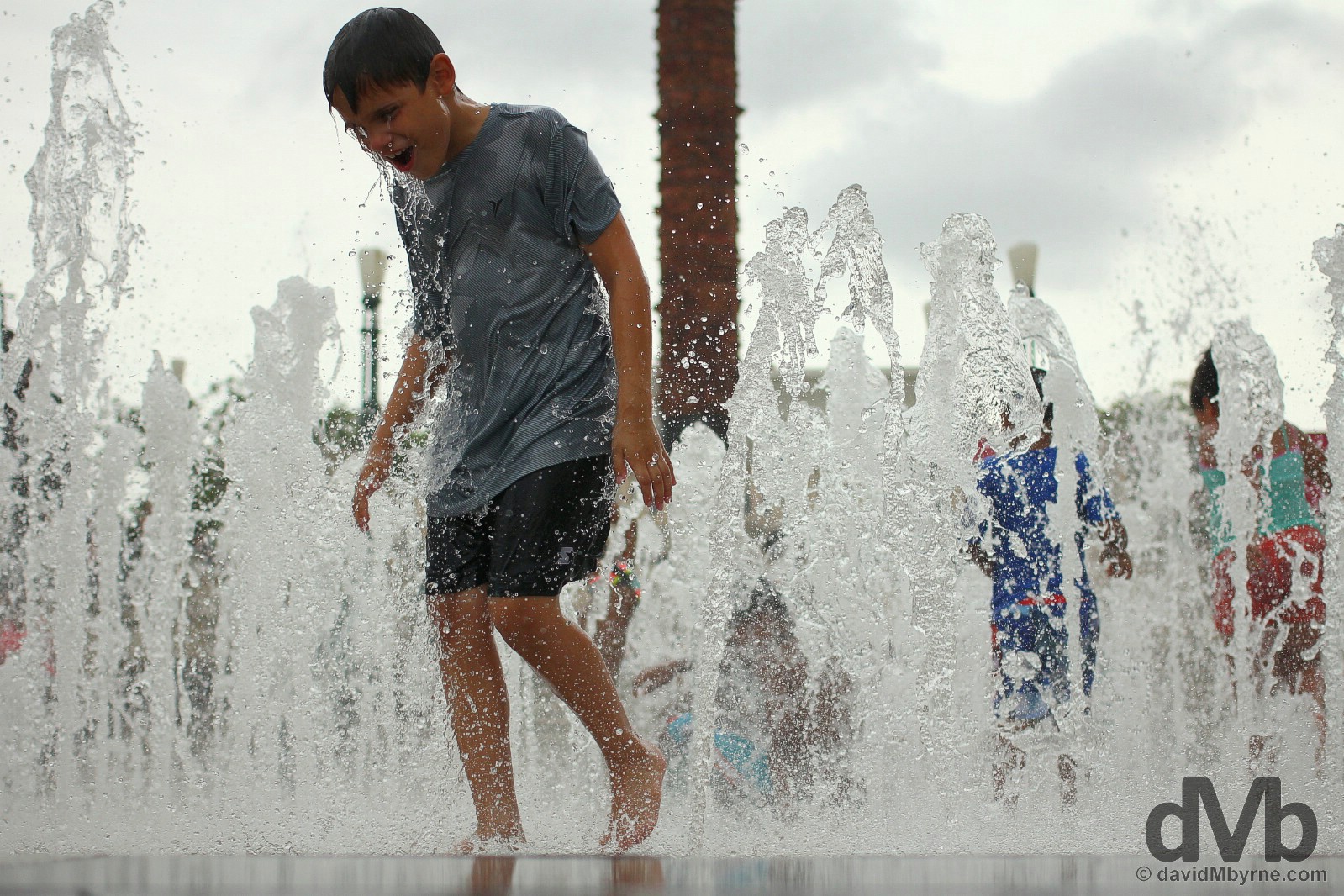 Cooling down in Plaza del Quinto Centenario in Old San Juan, Puerto Rico, Greater Antilles. May 31, 2015.