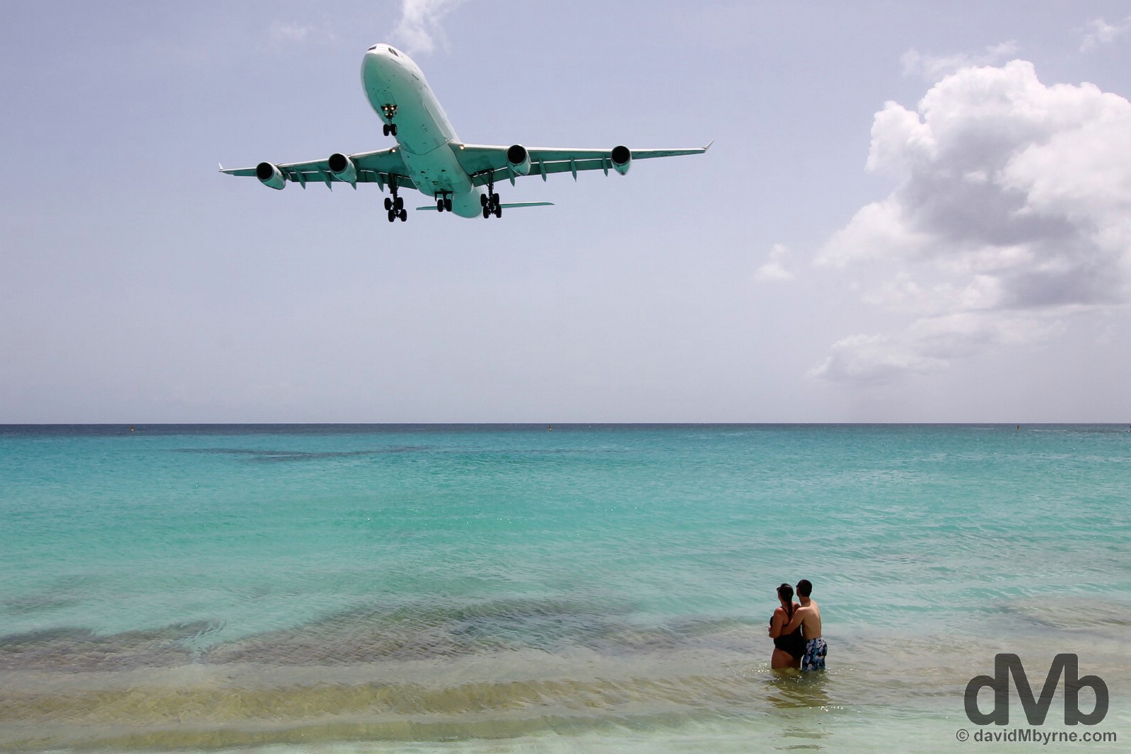 An approach to Juliana Airport as viewed from the warm waters of Maho Bay, Sint Maarten, Lesser Antilles. June 8, 2015.