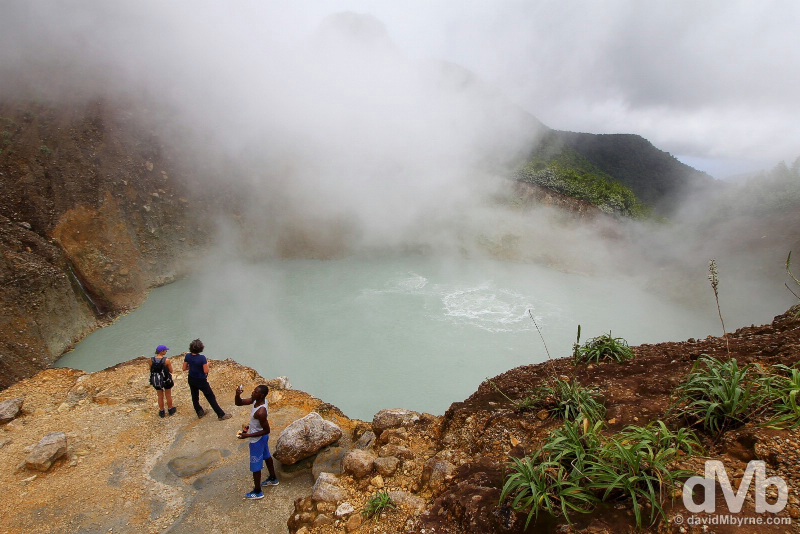 Overlooking a bubbling Boiling Lake in Morne Trois Pitons National Park, Dominica, Lesser Antilles. June 11, 2015.
