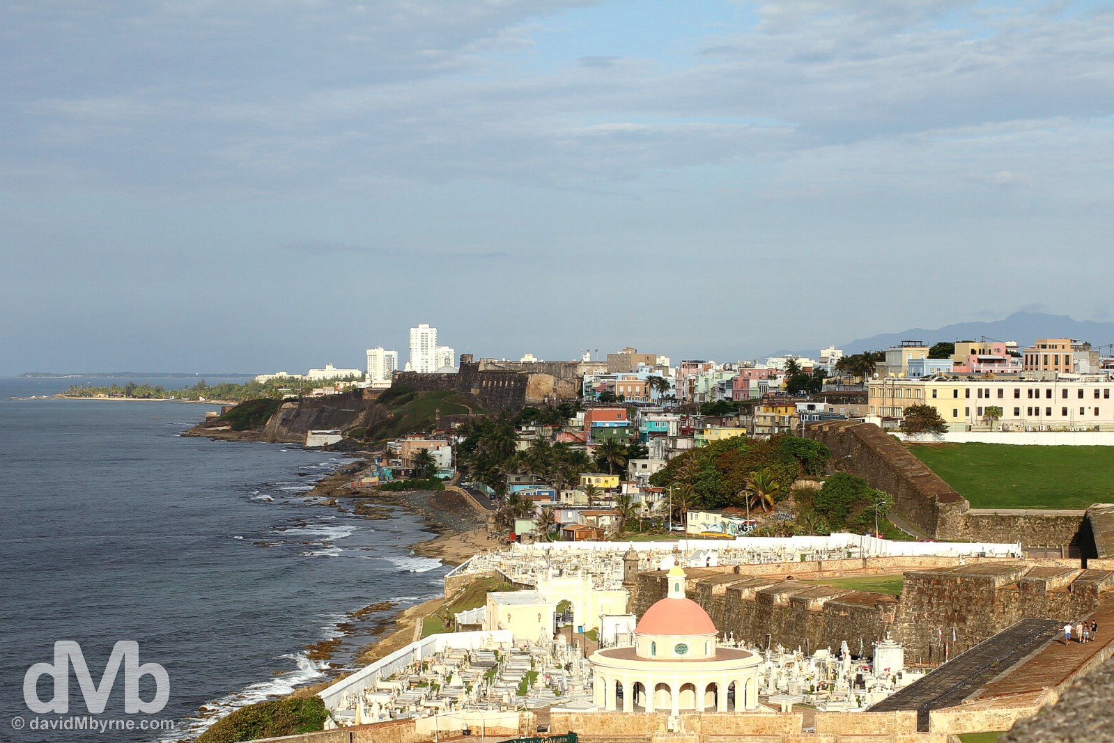 The northern, Atlantic-facing coast of the San Juan Islet as seen from the ramparts of Castillo San Felipe del Morro in Viejo (Old) San Juan, Puerto Rico, Greater Antilles. June 2, 2015.