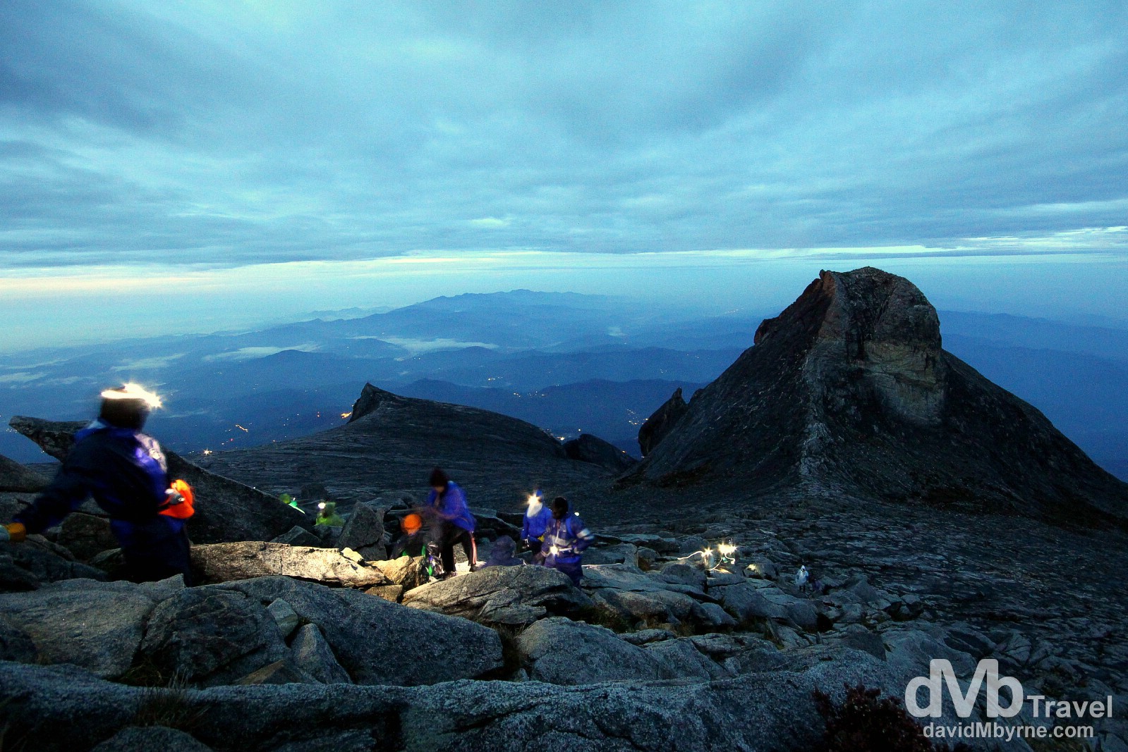 Climbers approaching the 4,095m (13,435ft) summit of Mount Kinabalu, the highest point on Borneo, the world's third largest island. Sabah, Malaysian Borneo. June 23rd 2012