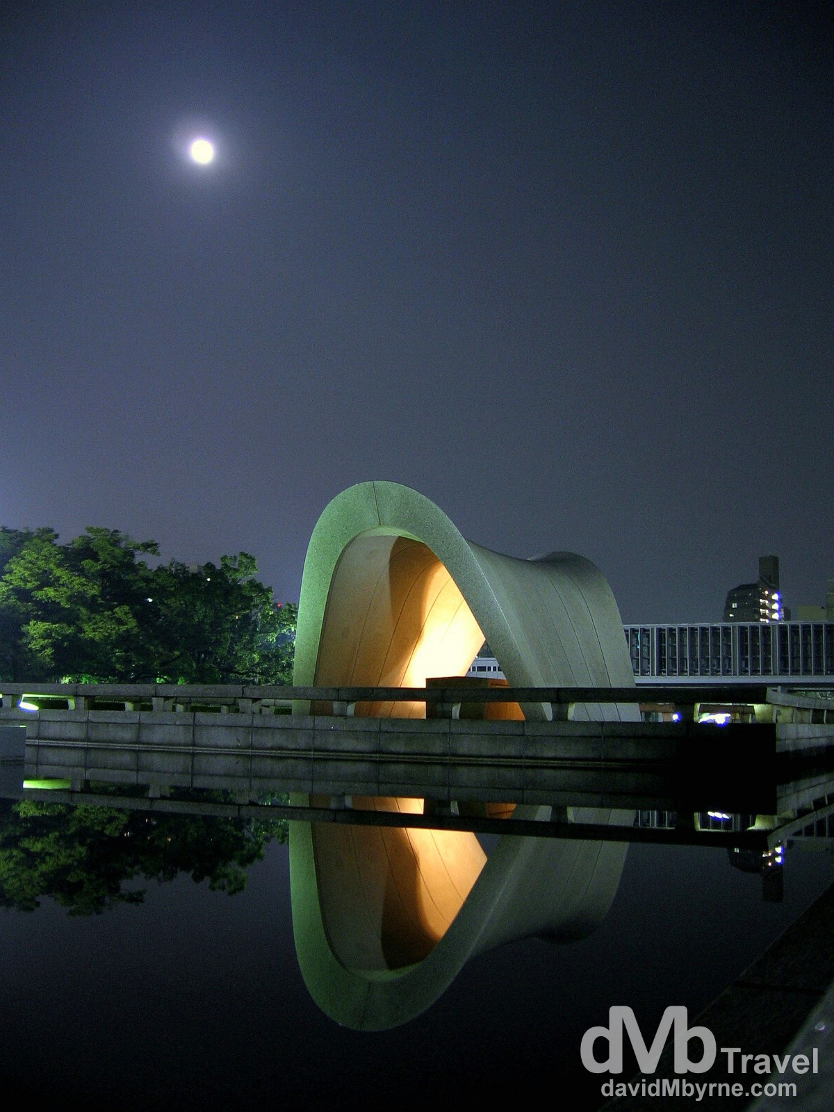 Reflections of the Memorial Cenotaph in Hiroshima Peace Memorial Park, Hiroshima, Japan. July 22nd 2005.