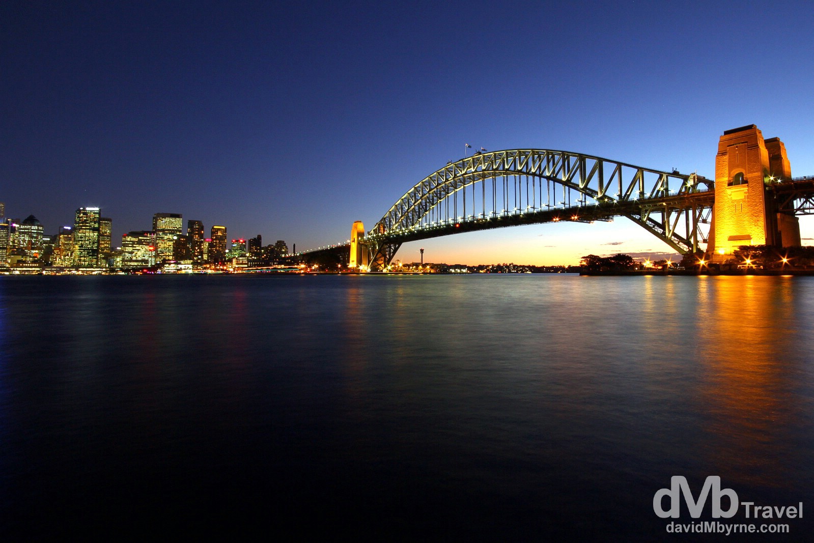 The Sydney Harbour Bridge & CBD skyline at dusk as seen from the Kirribilli district of the city. June 7th 2012.  