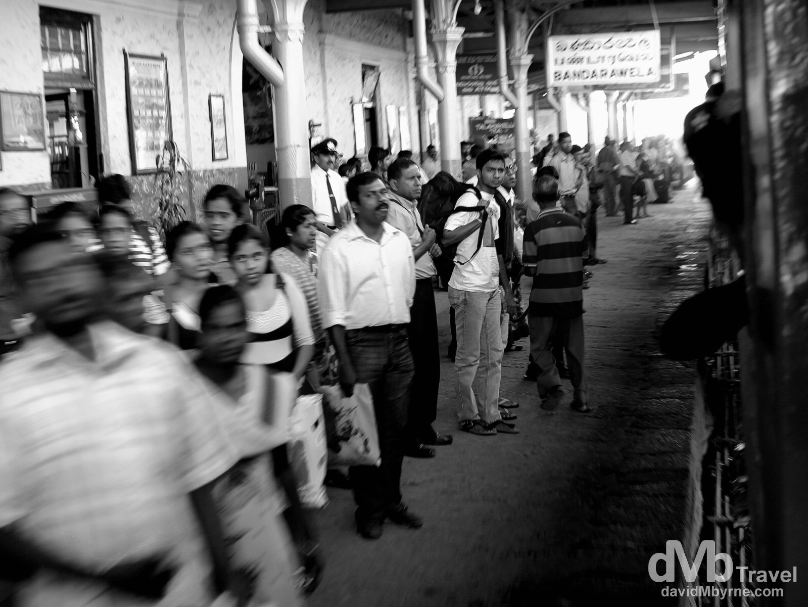 Waiting as the Colombo-bound train approaches. Bandarawela Train Station, central Sri Lanka. September 5th 2012.